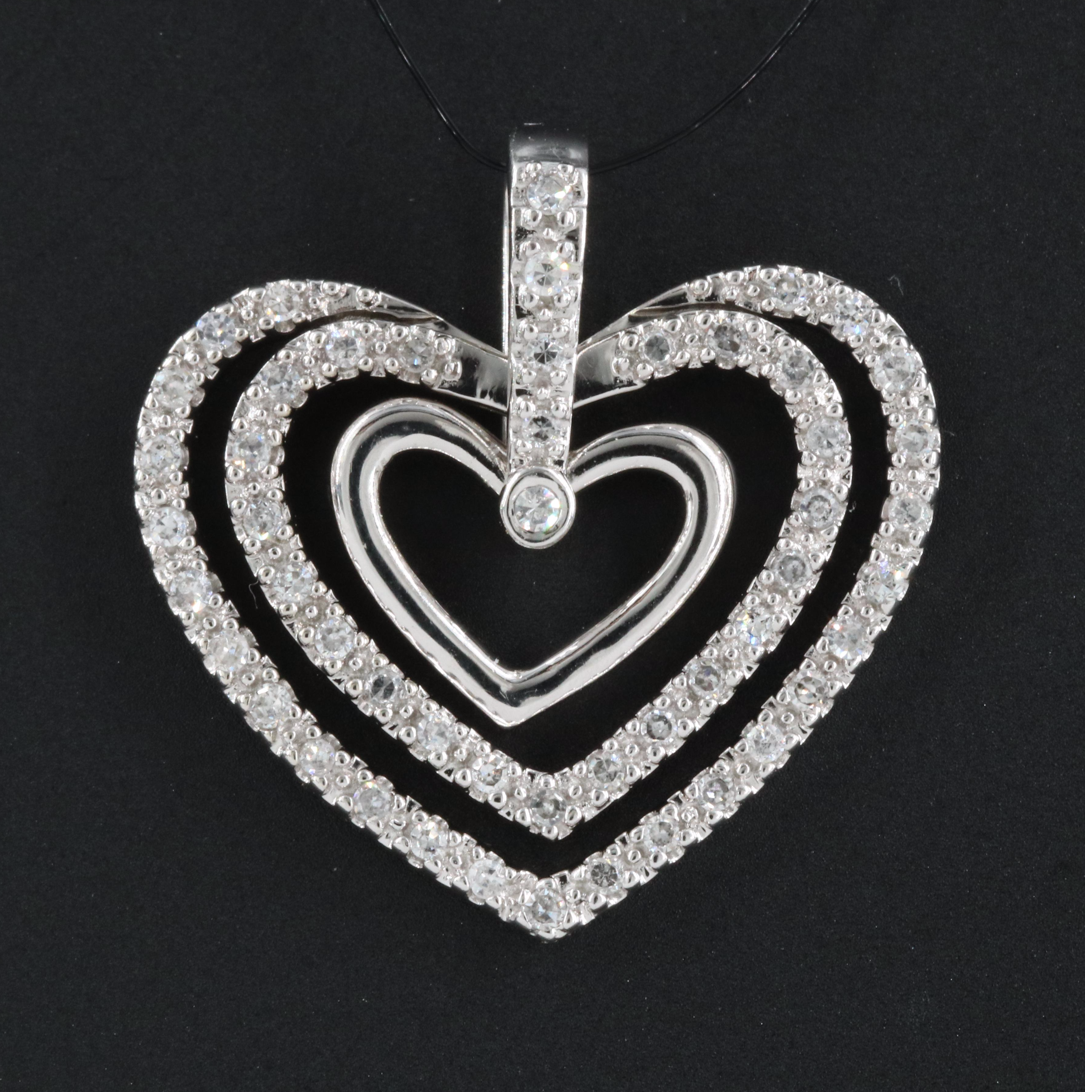 14K 0.25 CTW Diamond Concentric Heart Pendant