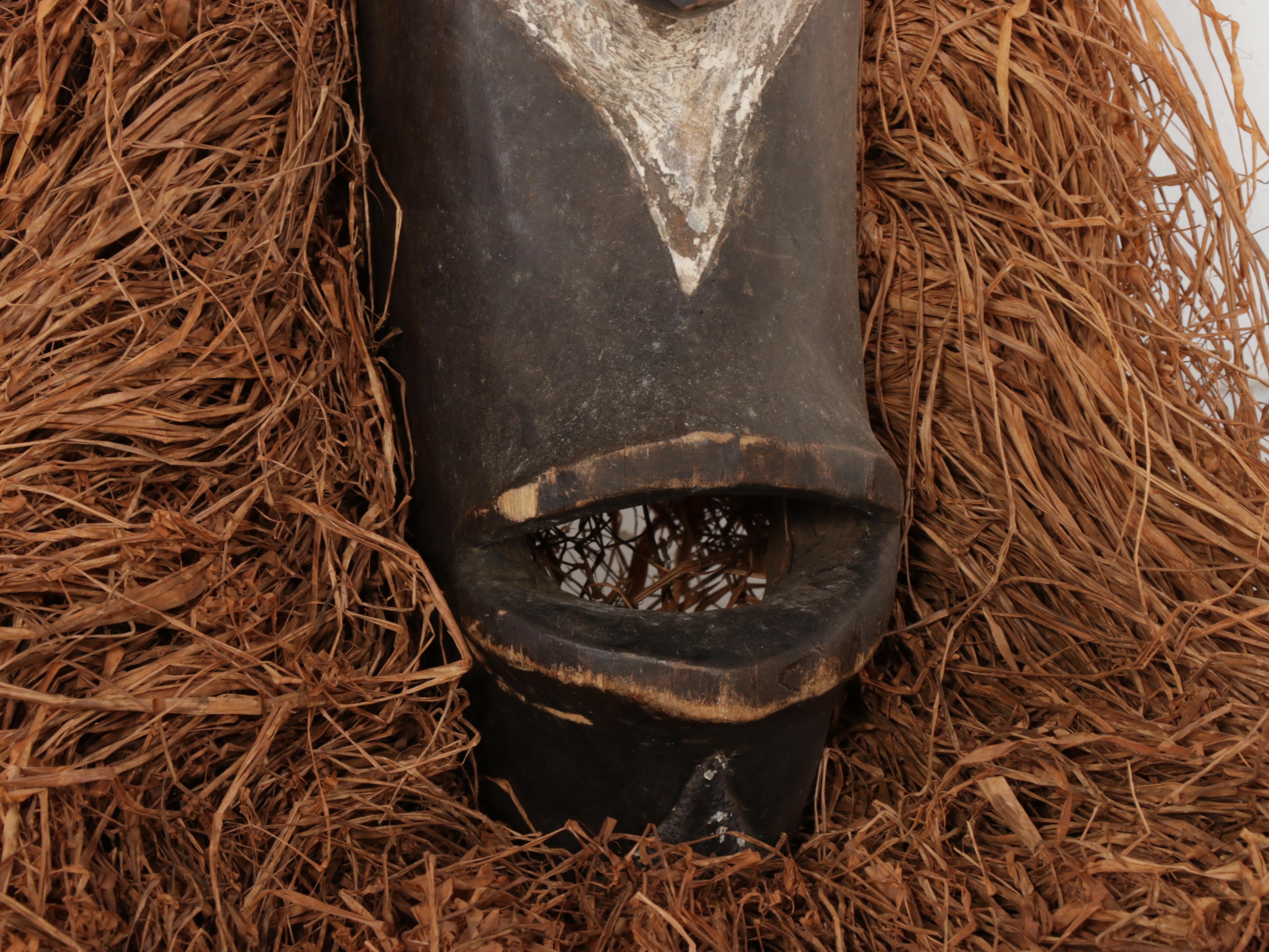 West African Fang Style Carved and Pigmented Mask with Raffia