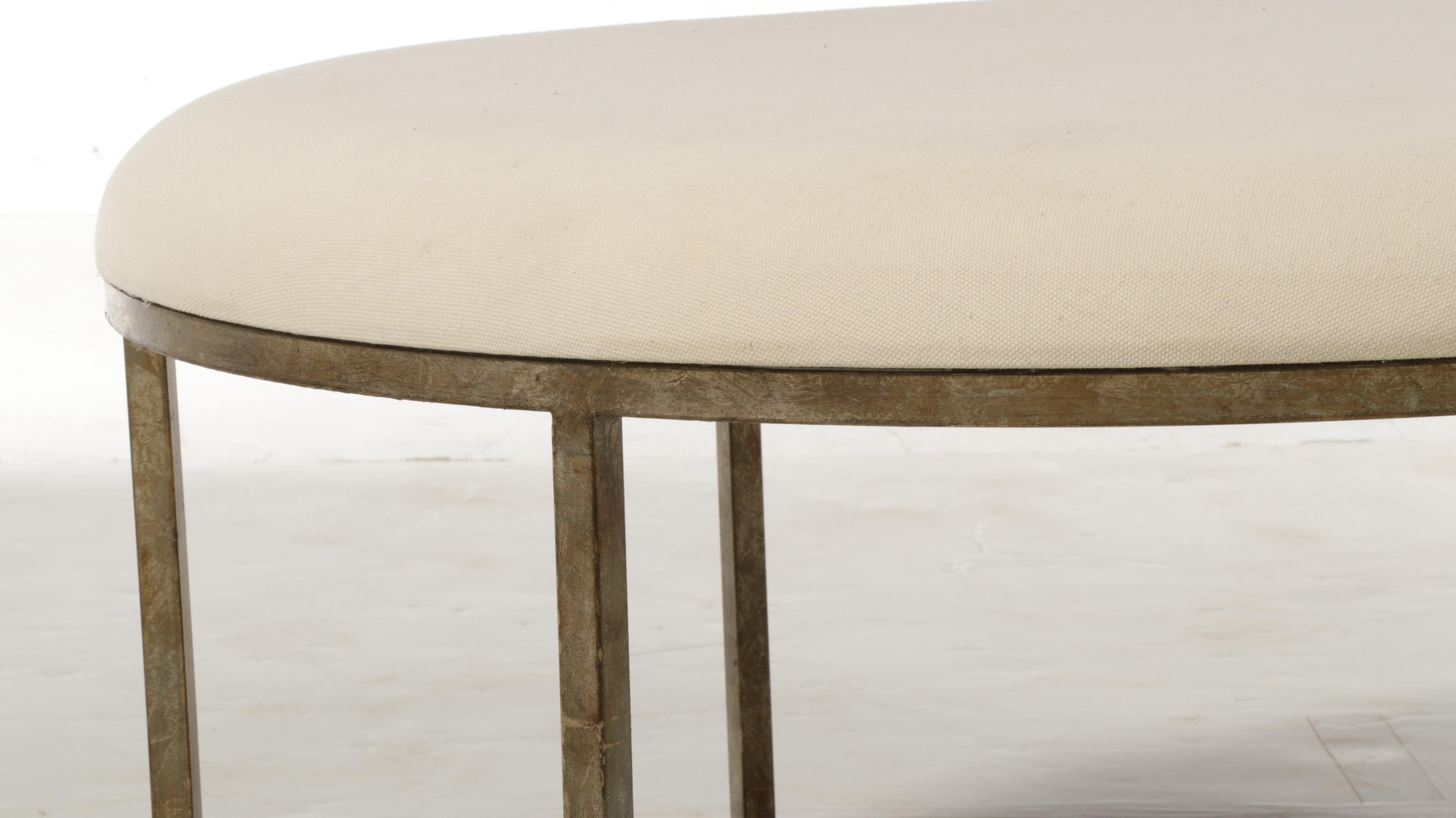 Modernist Style Gilt Metal and Linen Blend Upholstered Cocktail Ottoman