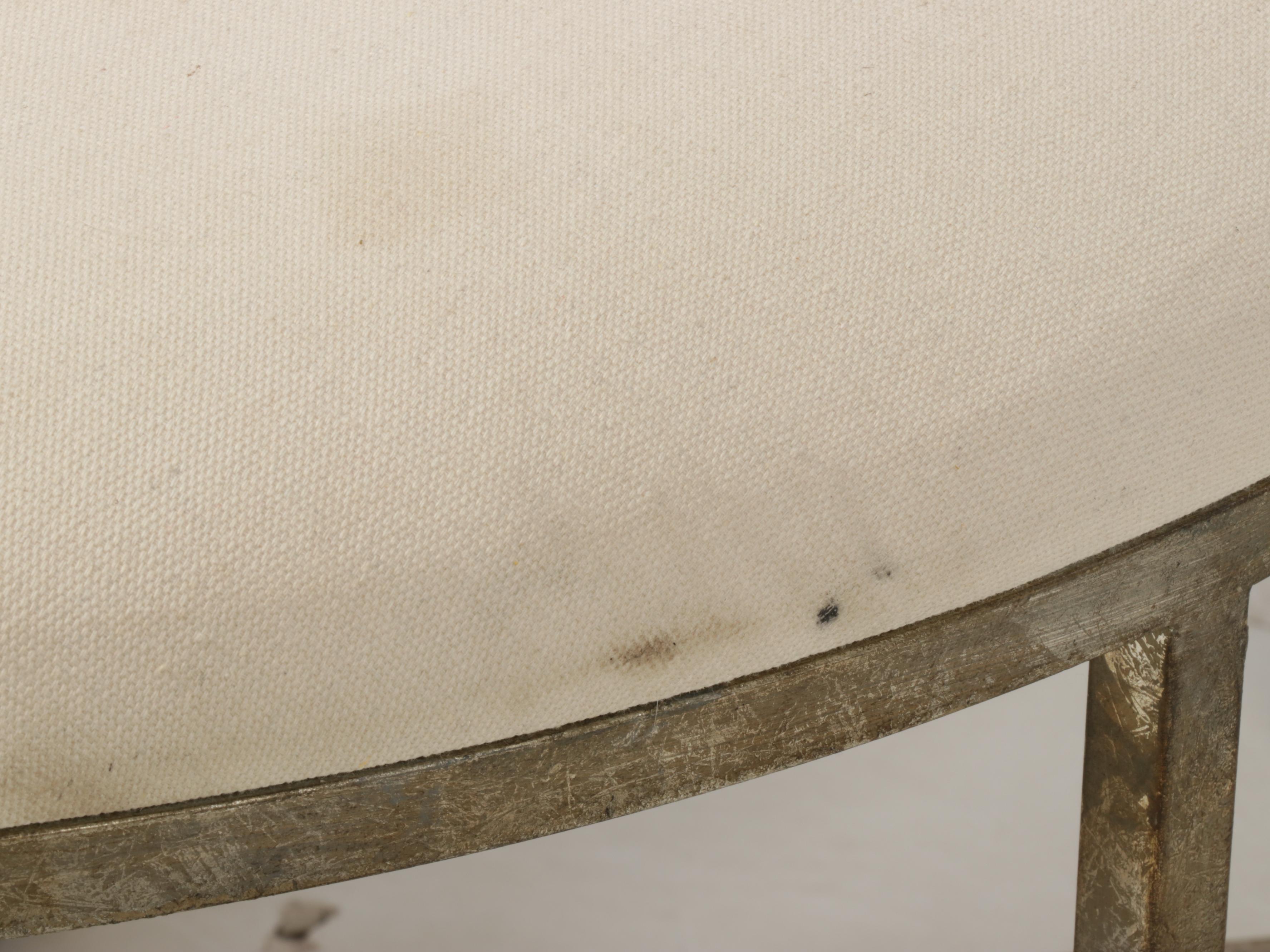 Modernist Style Gilt Metal and Linen Blend Upholstered Cocktail Ottoman