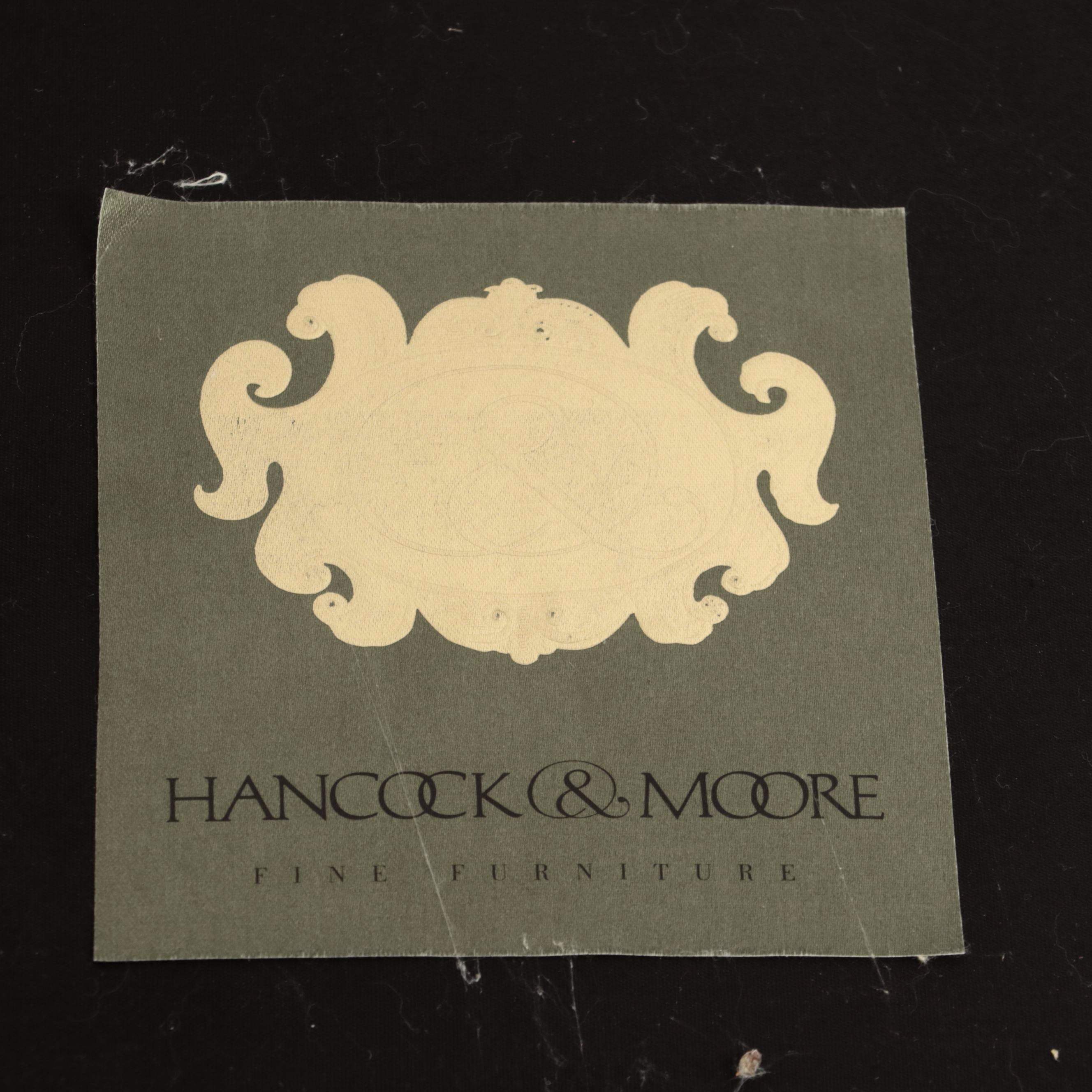 Hancock & Moore Brass-Tacked and Burgundy Leather Reclining Armchair and Ottoman