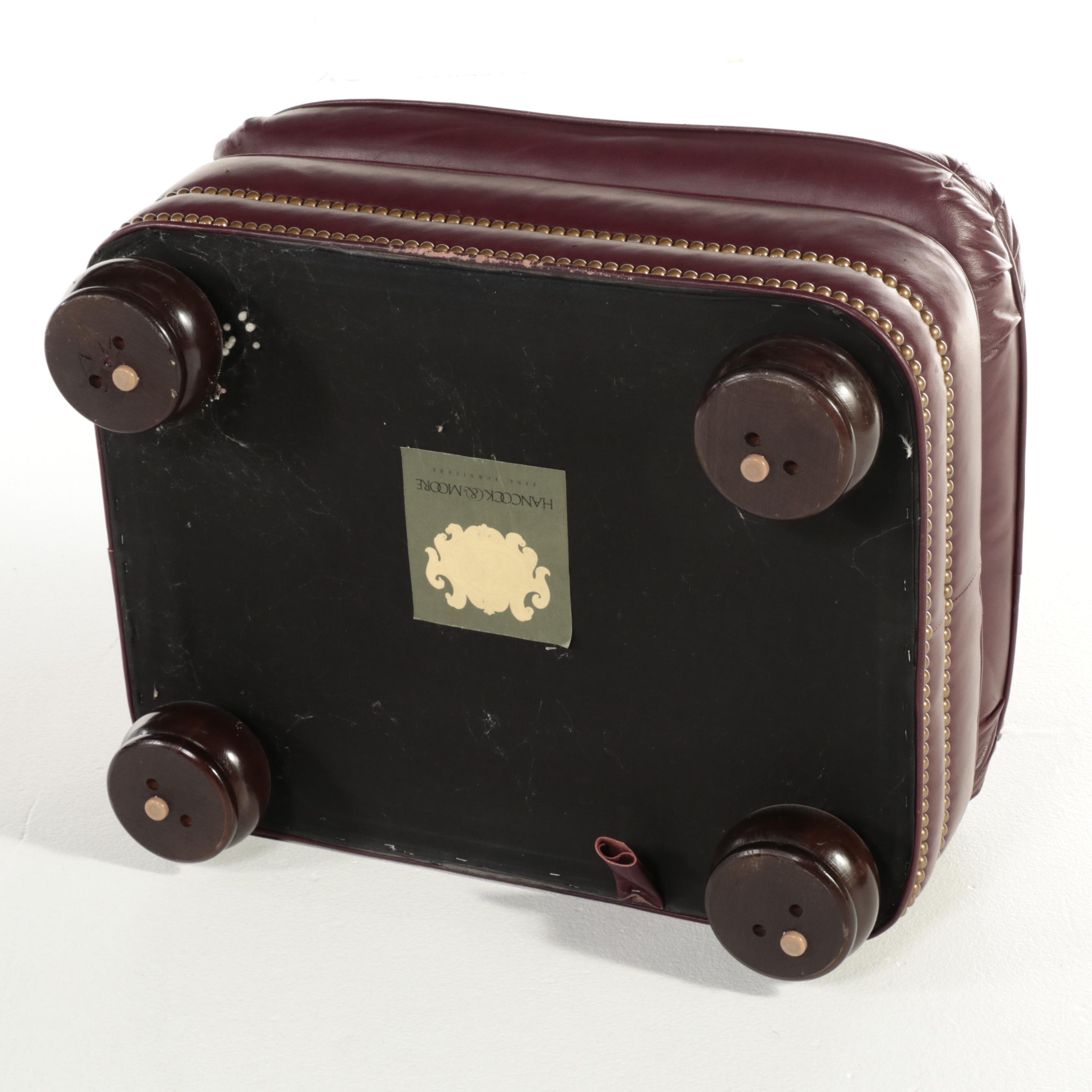 Hancock & Moore Brass-Tacked and Burgundy Leather Reclining Armchair and Ottoman