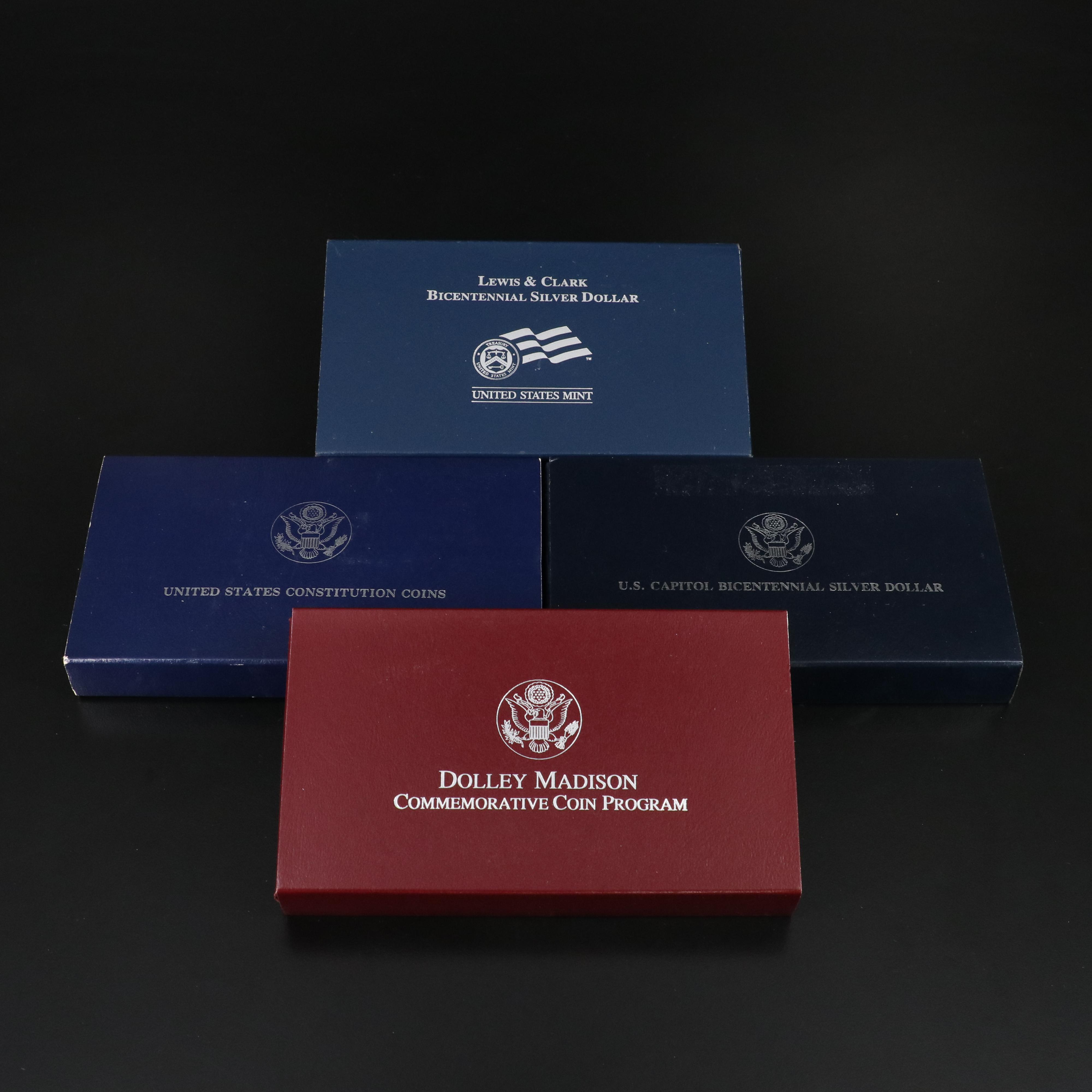 Four Different Modern Proof Commemorative Silver Dollars