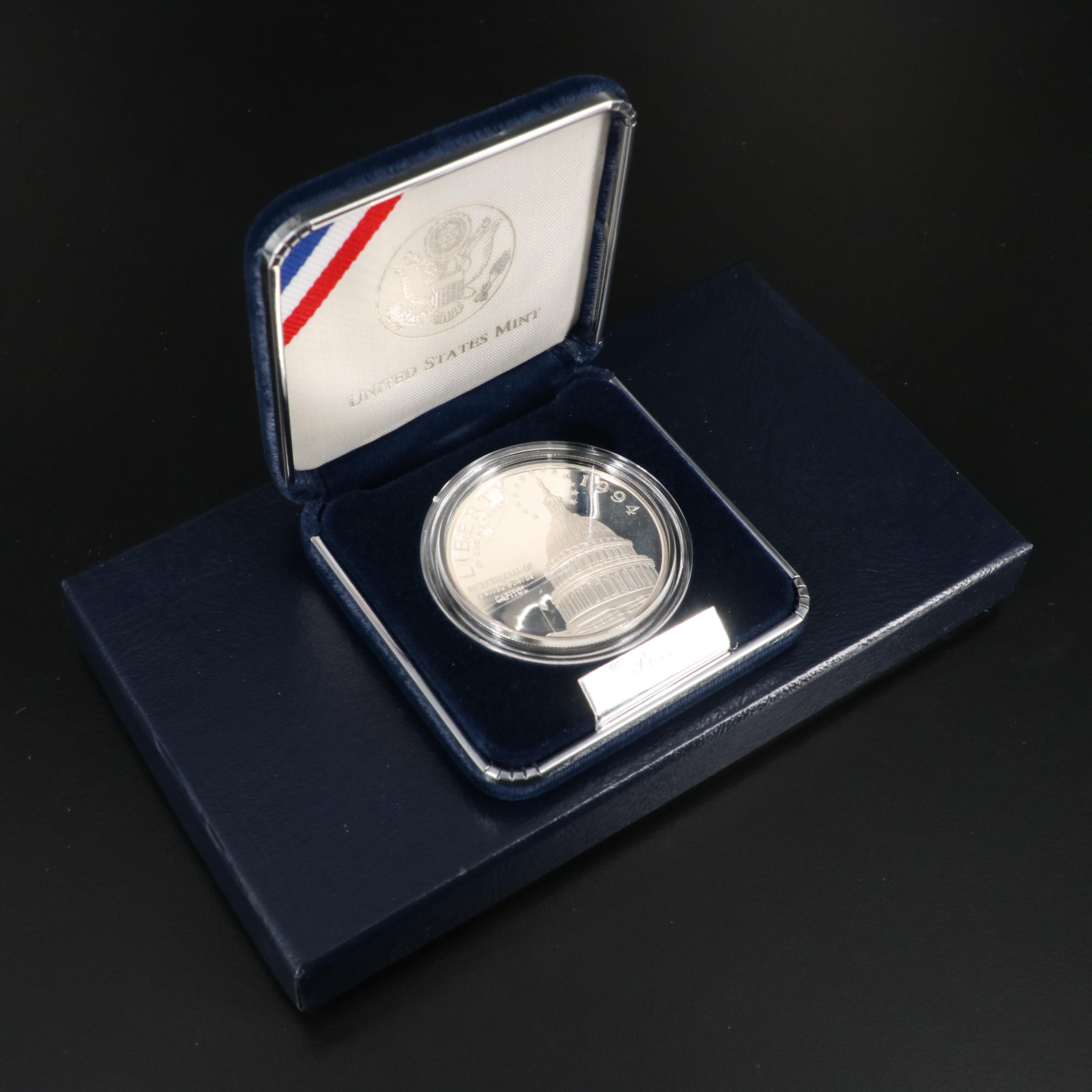 Four Different Modern Proof Commemorative Silver Dollars