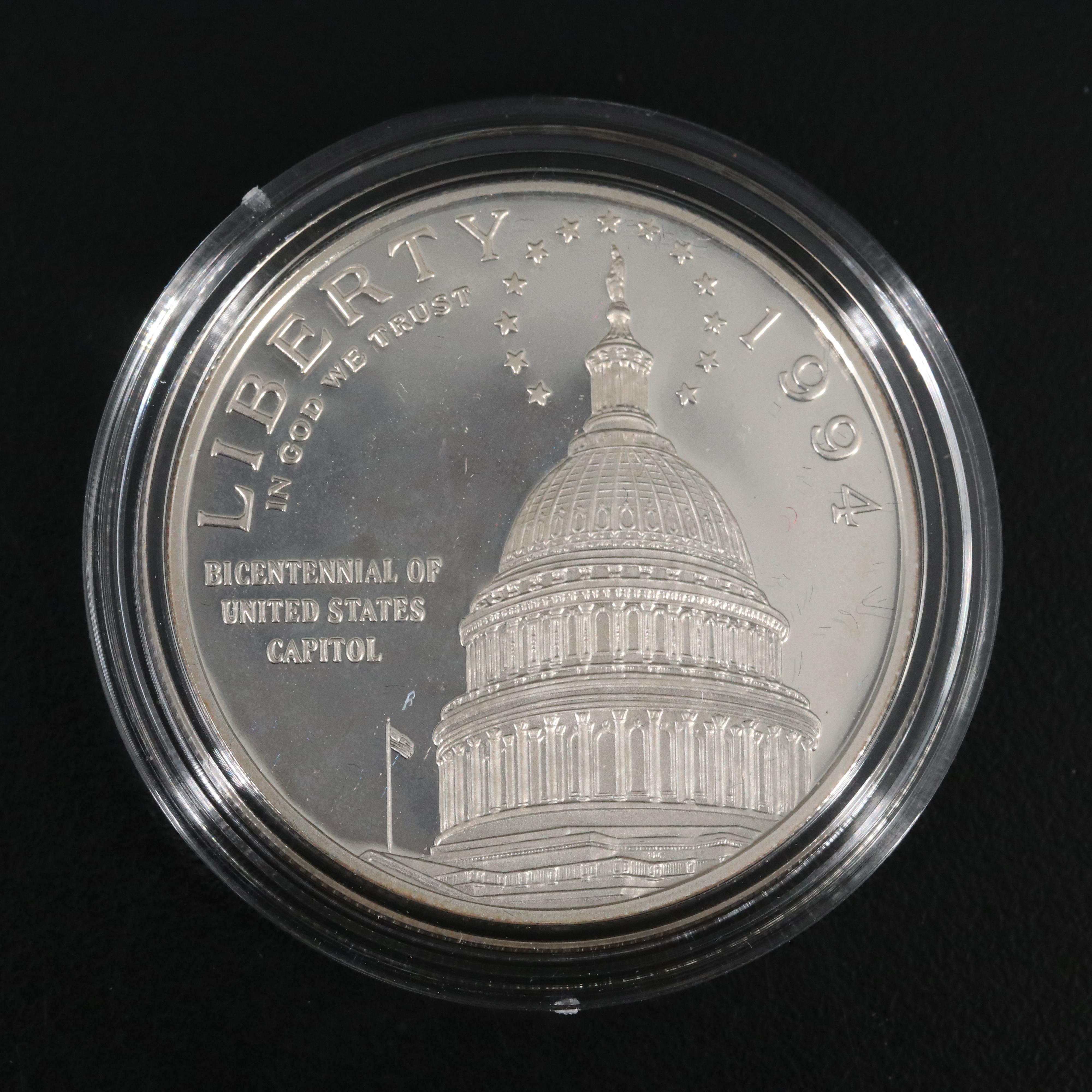 Four Different Modern Proof Commemorative Silver Dollars