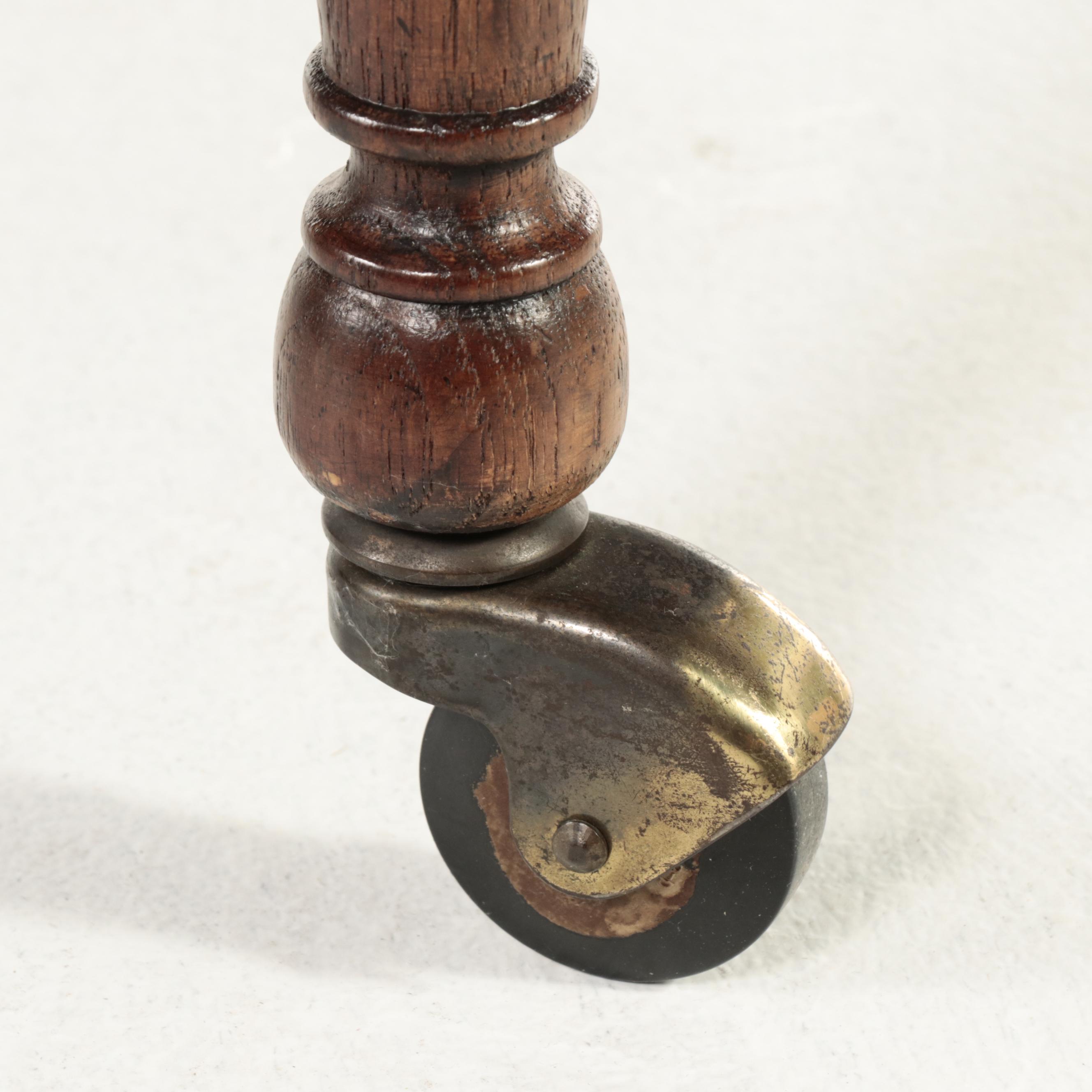 Renaissance Style Wooden Expansion Pedestal Table with Four Rolling Tub Chairs
