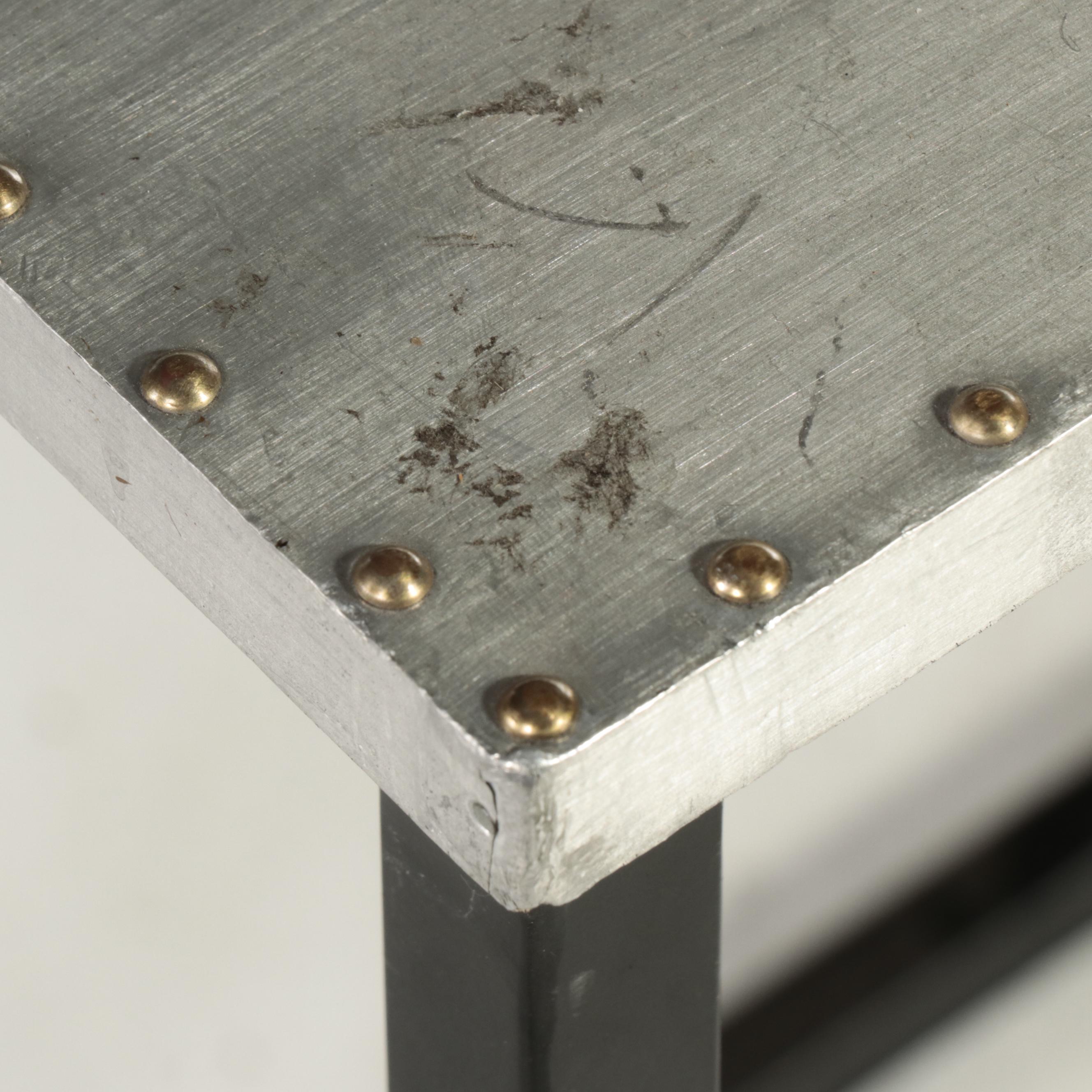 Two Contemporary Black Powder-Coated Metal Nesting C-Tables with Metal-Clad Tops