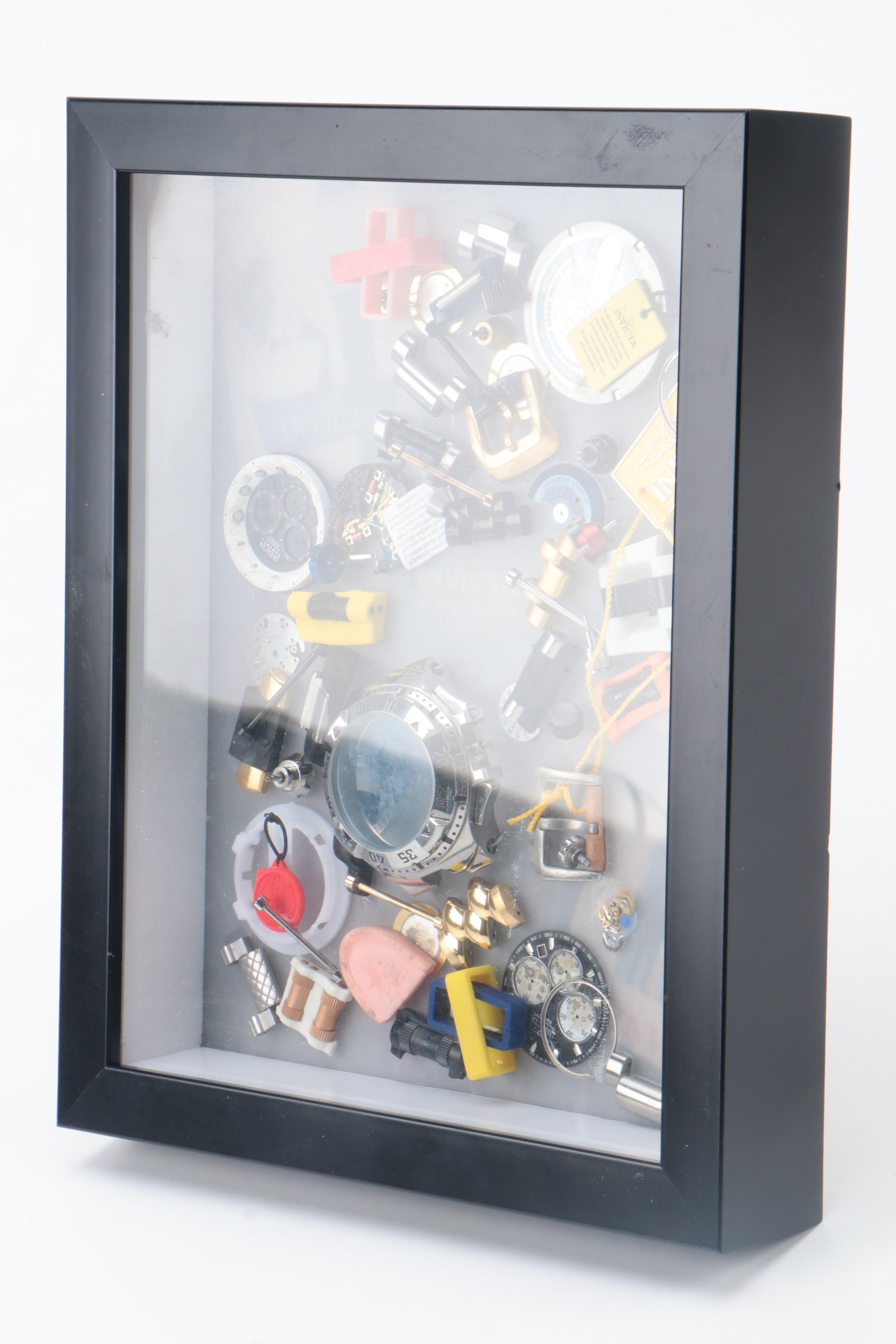 Invicta Watch Pieces in Plastic Shadow Box