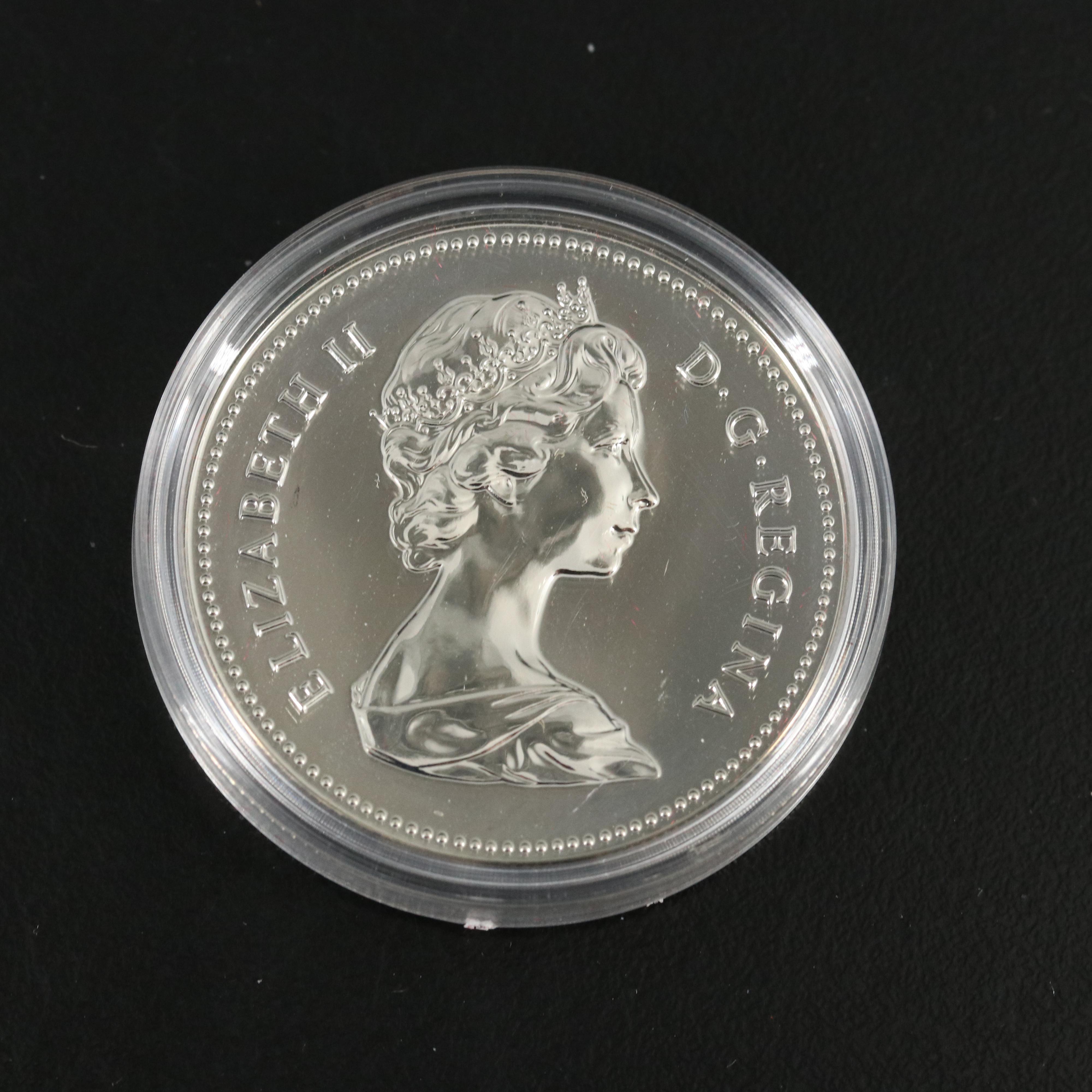 Seven Commemorative Silver Coins and Medals