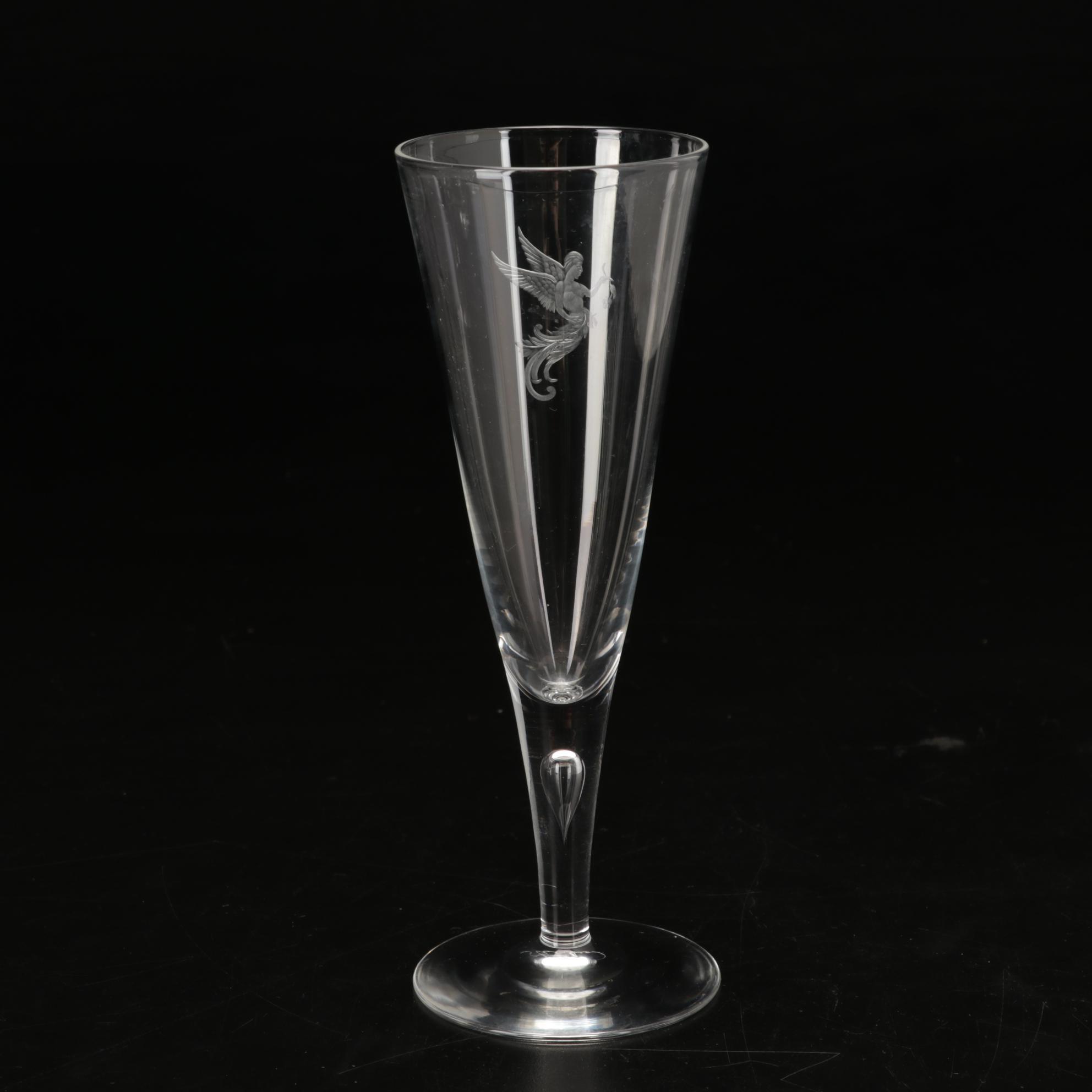 Steuben Flutes with Etched Winged Figure Design and Suspended Bubble Stem