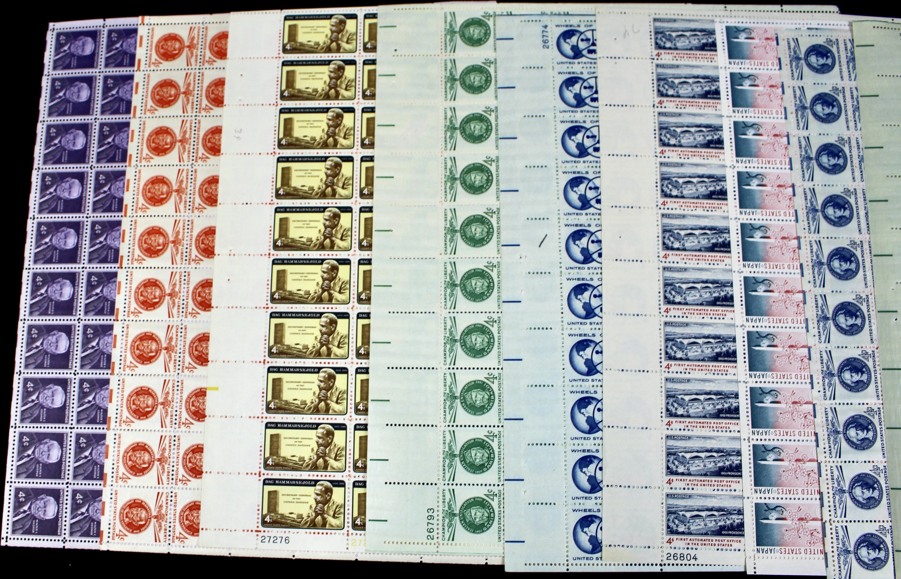 Fifty-Eight Different 4-Cent Postage Stamp Sheets