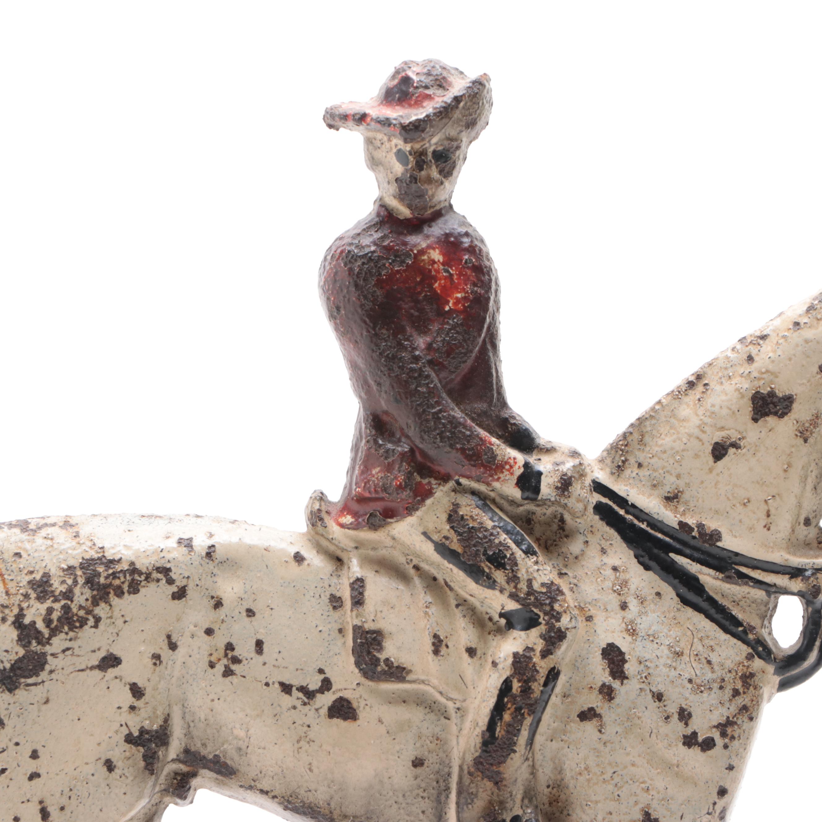 Cold Painted Cast Iron Horse and Rider Doorstop