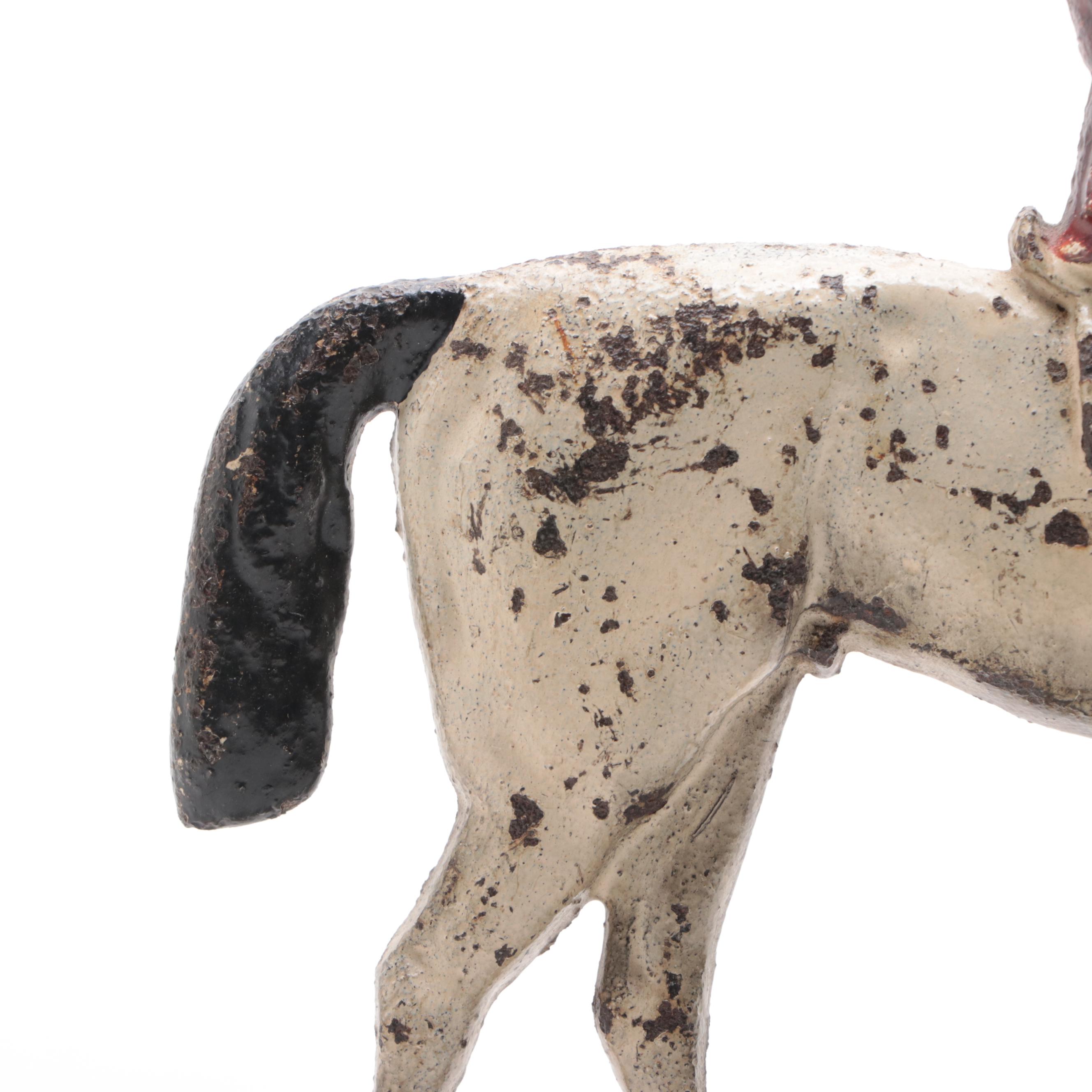Cold Painted Cast Iron Horse and Rider Doorstop