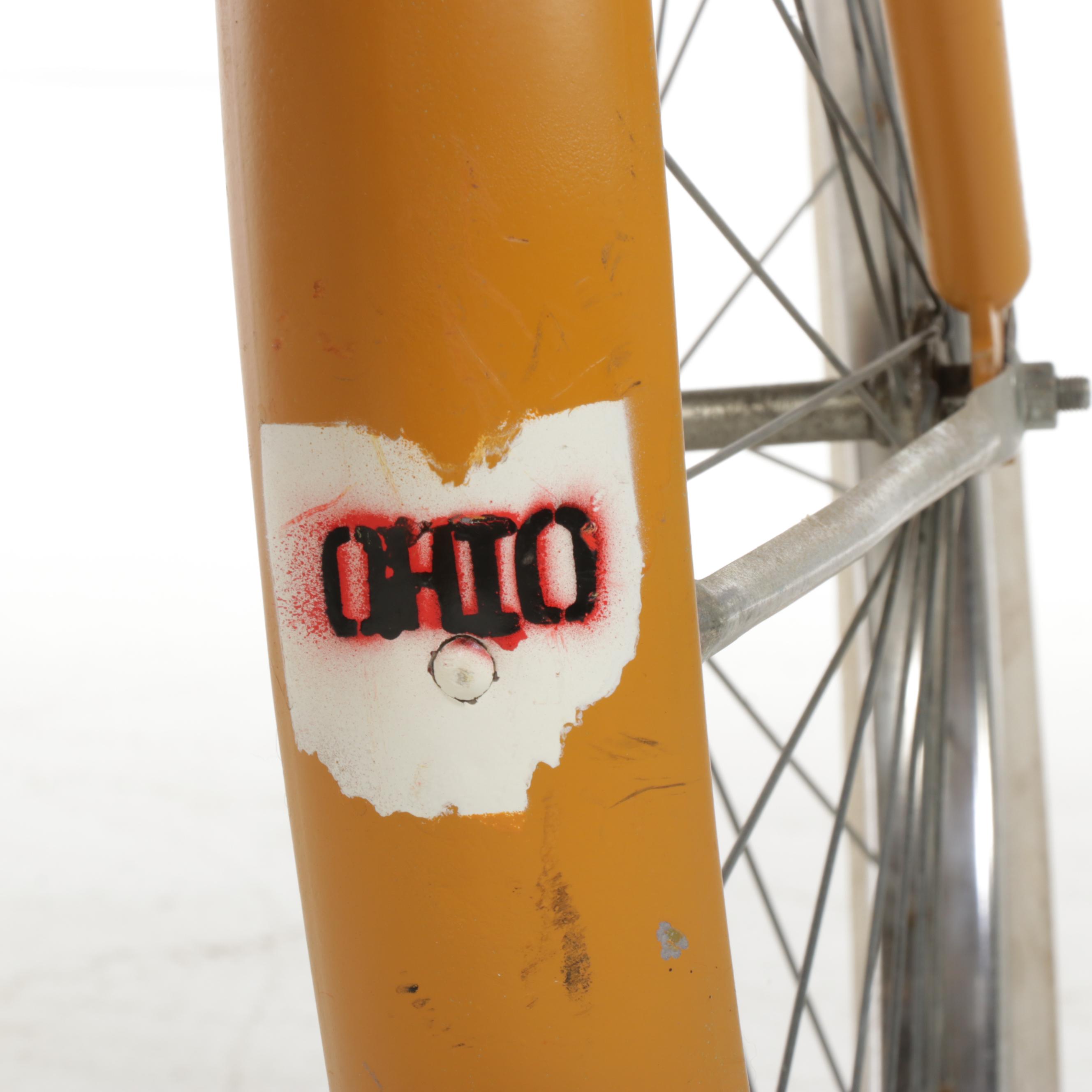 yellow cruiser bicycle