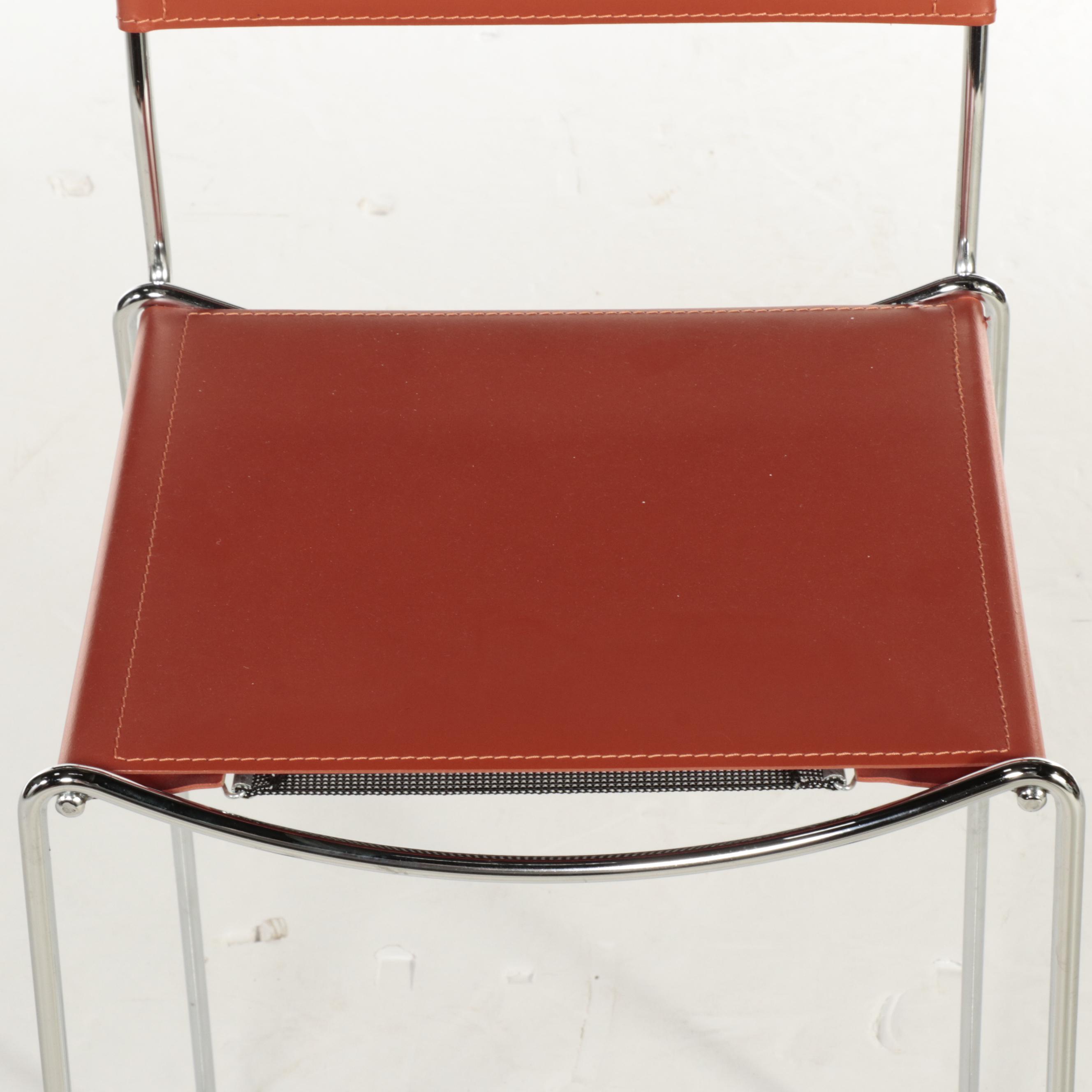 Four Italian Modern Leather and Chromed Steel Stools