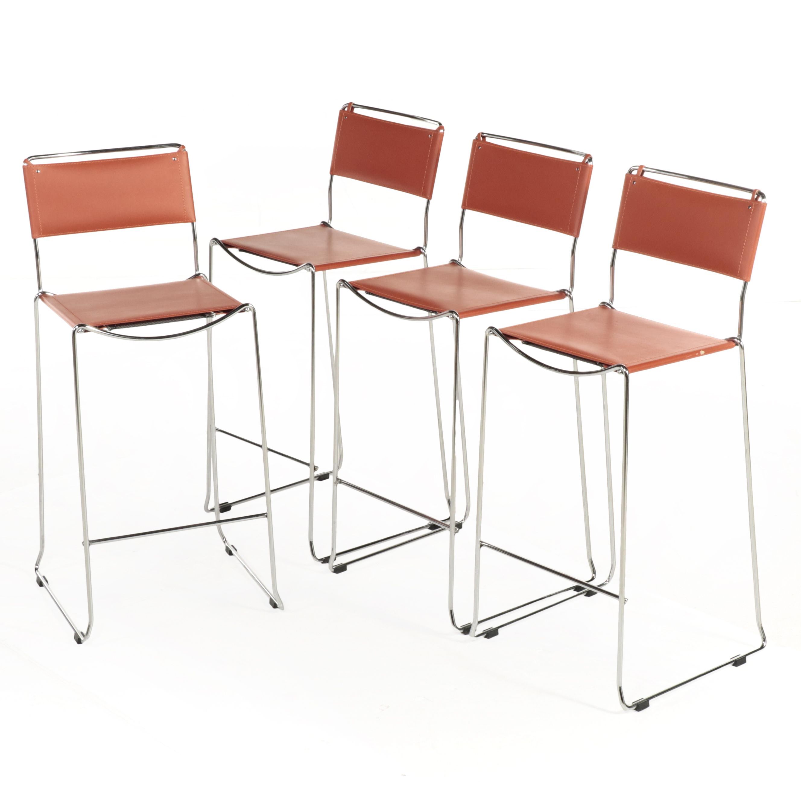 Four Italian Modern Leather and Chromed Steel Stools