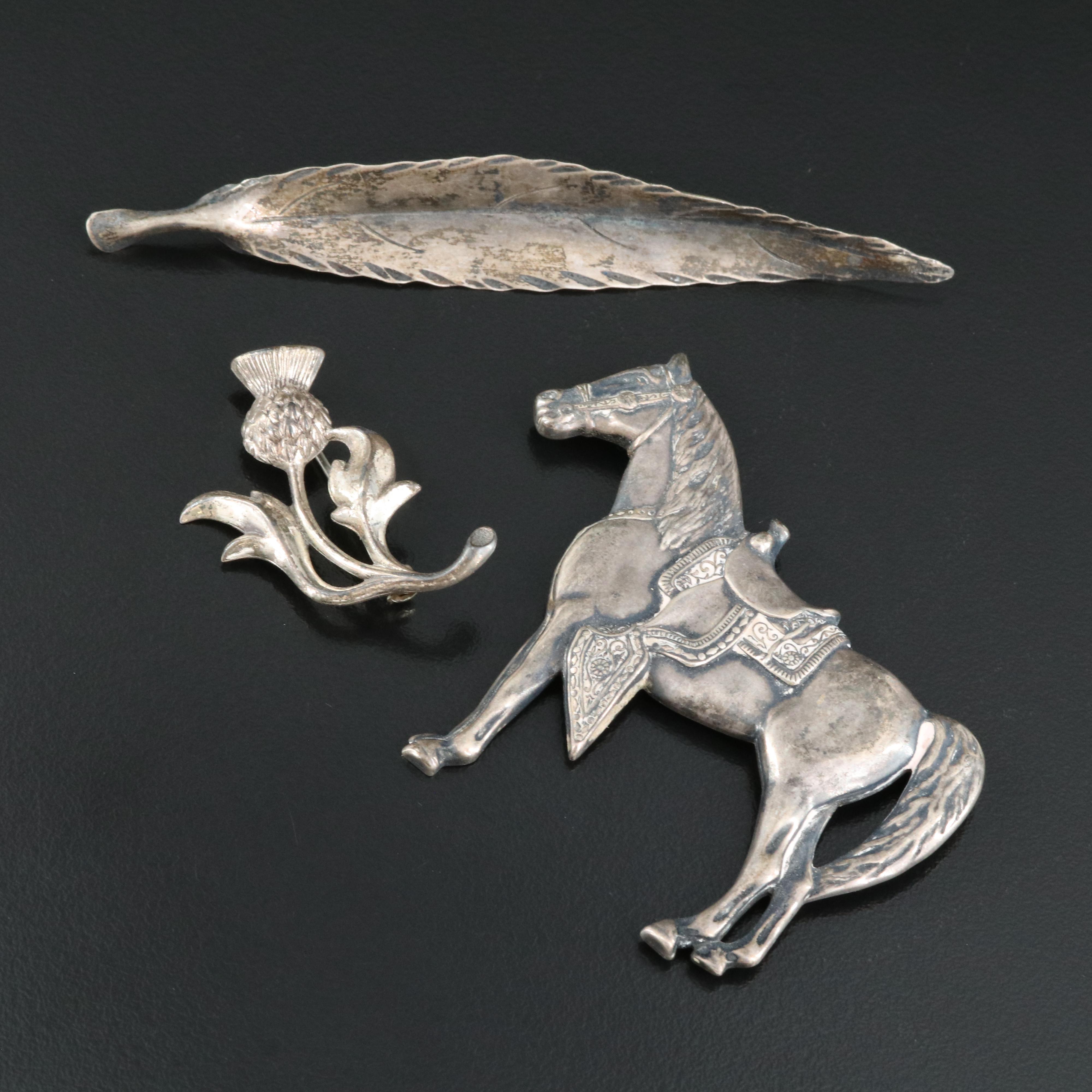 Stuart Nye Leaf and Beau Thistle Featured in Sterling Brooches