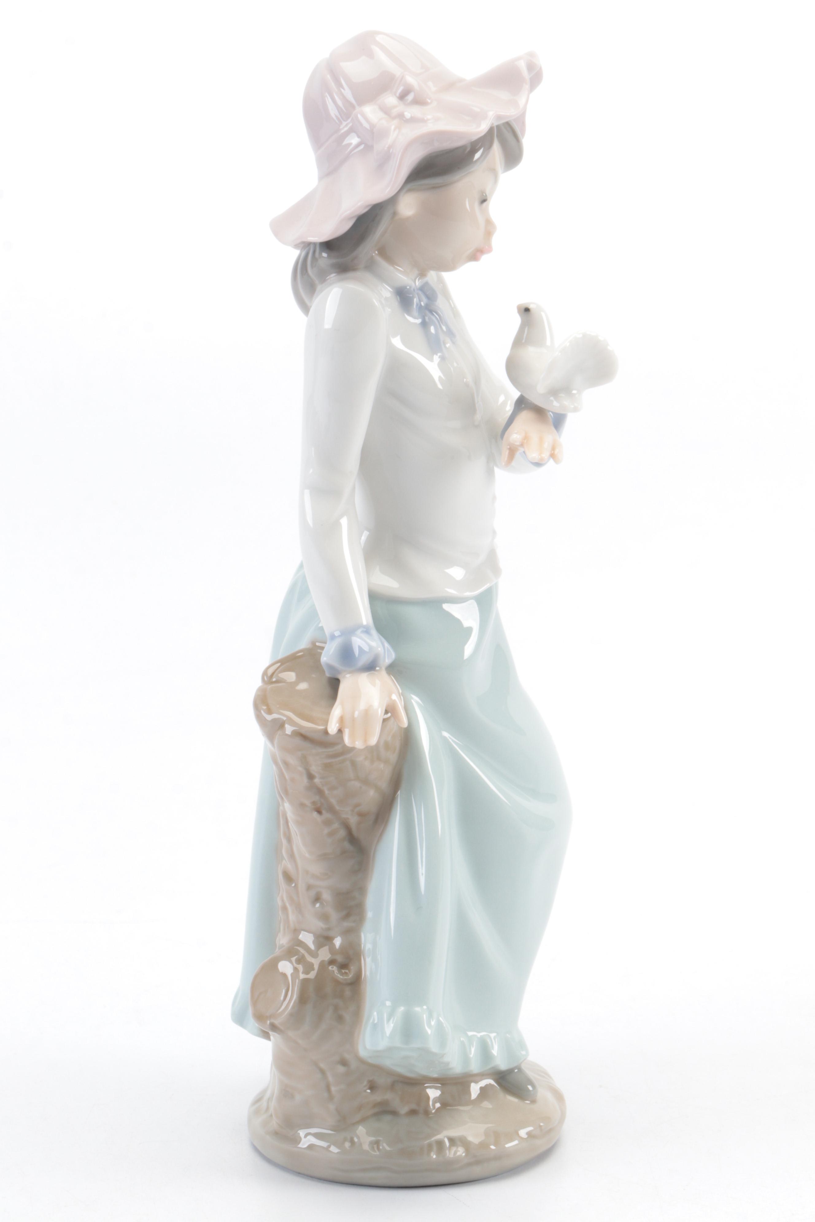 Lladró "Pierrot with Concertina" and Nao by Lladró "Girl with Dove" Figurines