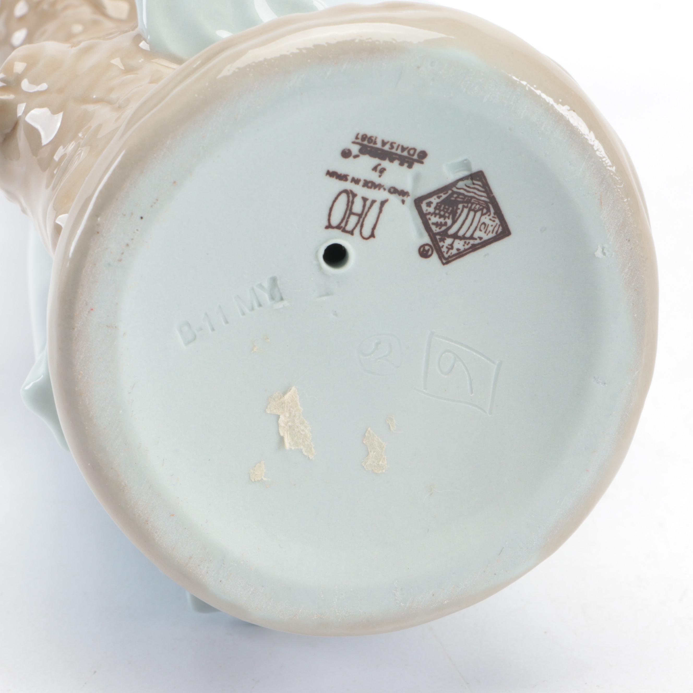 Lladró "Pierrot with Concertina" and Nao by Lladró "Girl with Dove" Figurines