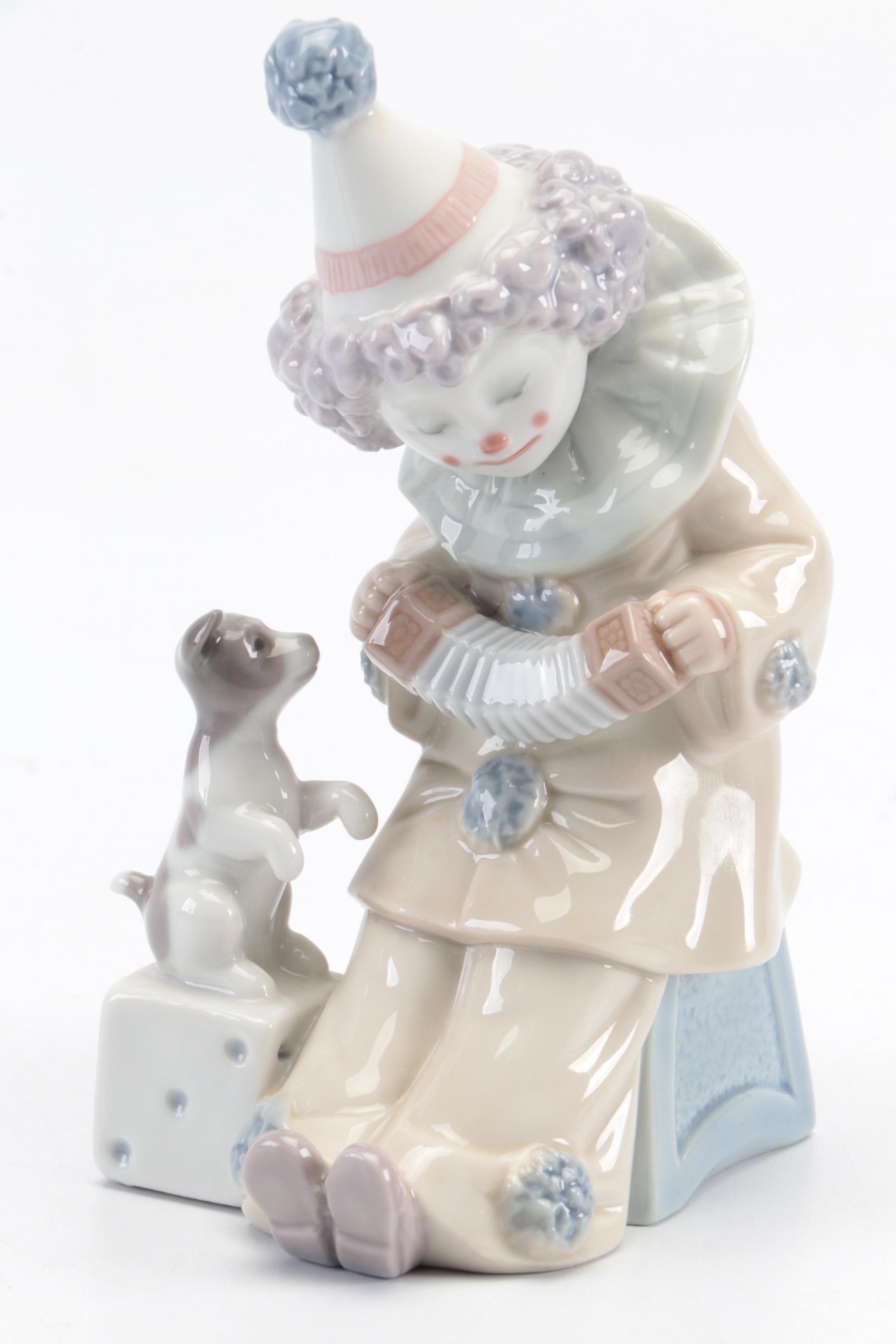 Lladró "Pierrot with Concertina" and Nao by Lladró "Girl with Dove" Figurines