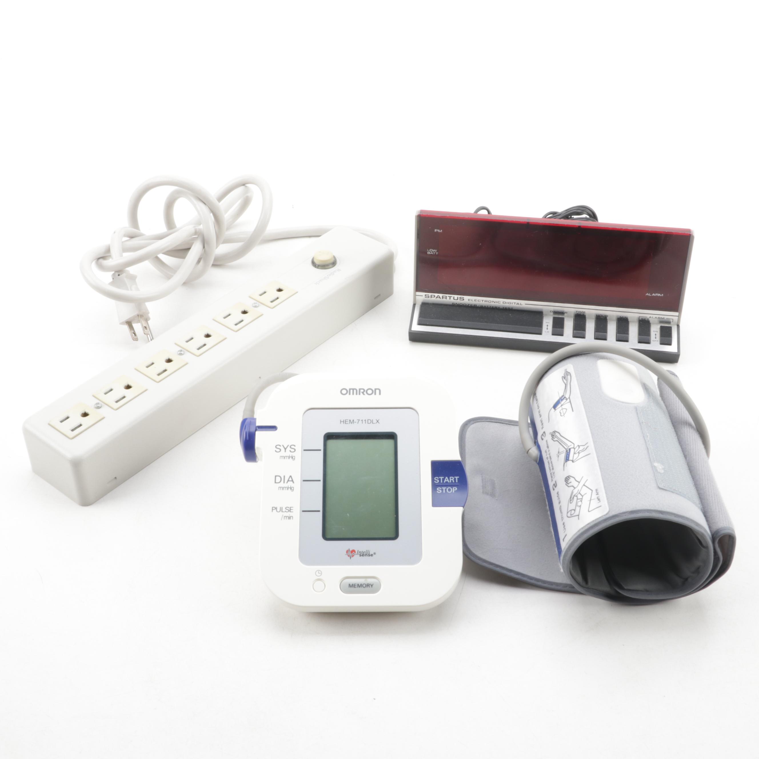 Omron Blood Pressure Monitor, Spartus Alarm Clock, and Radio Shack Power Strip