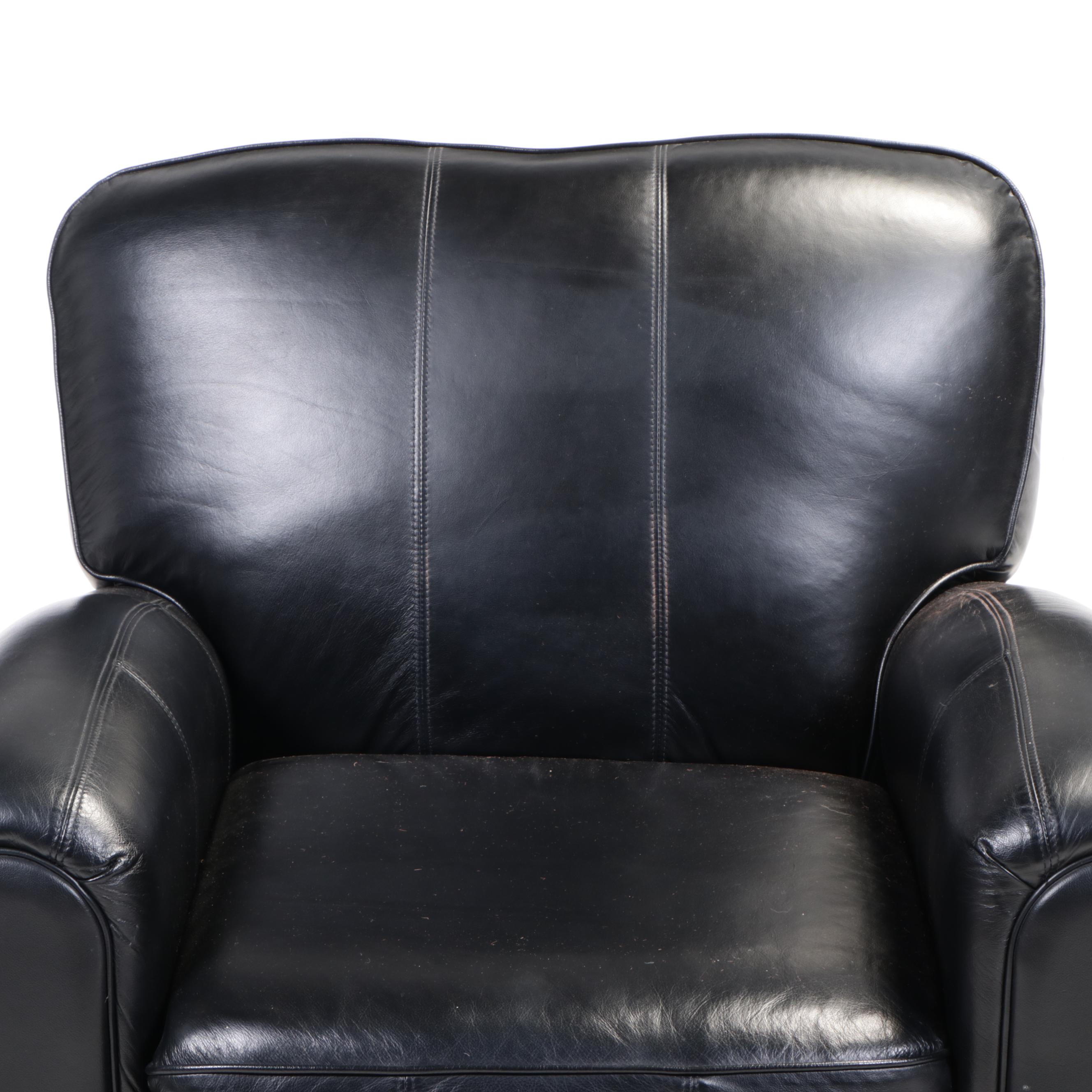 Contemporary Leather Upholstered Armchair and Ottoman