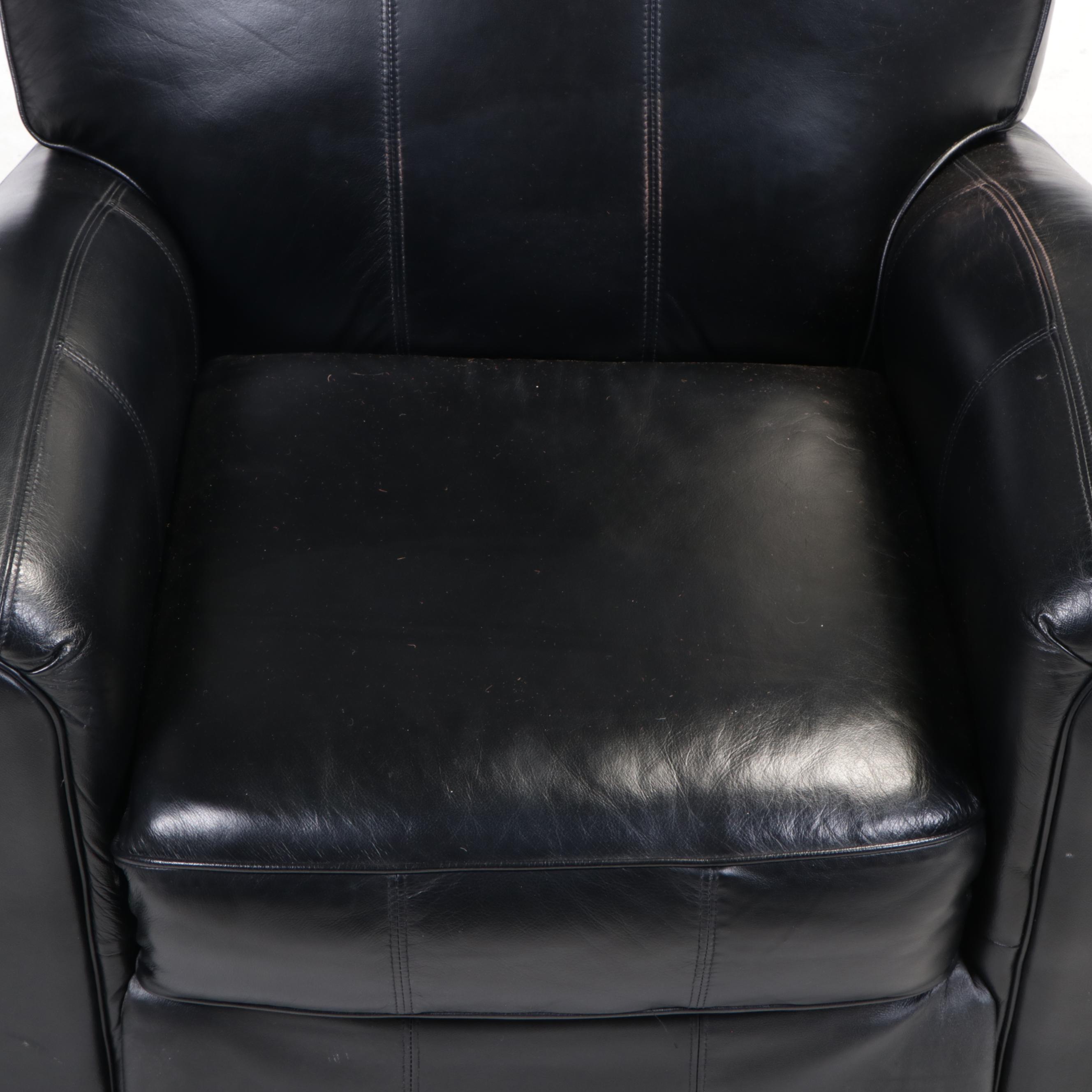 Contemporary Leather Upholstered Armchair and Ottoman
