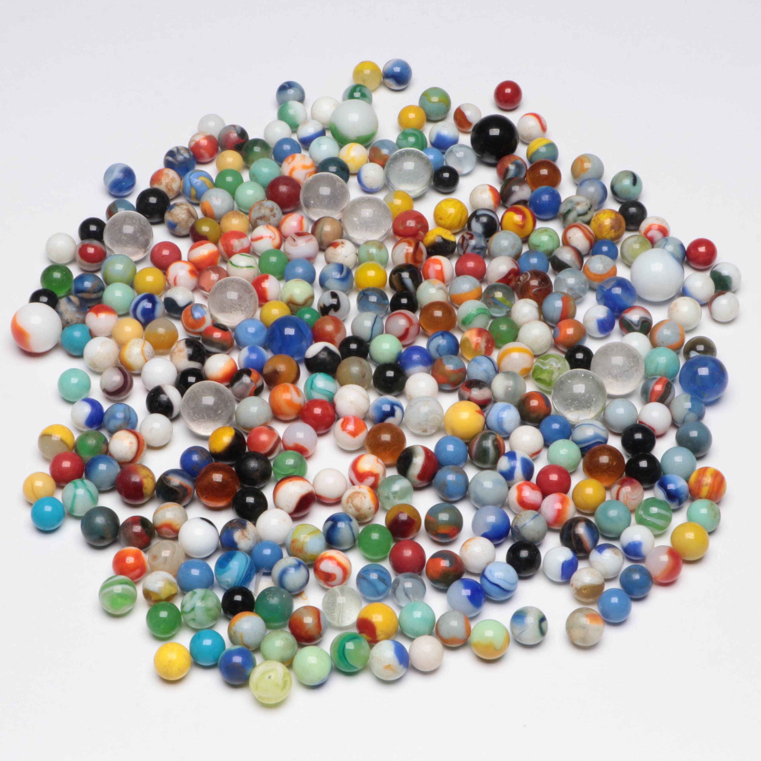 Uranium Glass with Other Marbles and Shooters