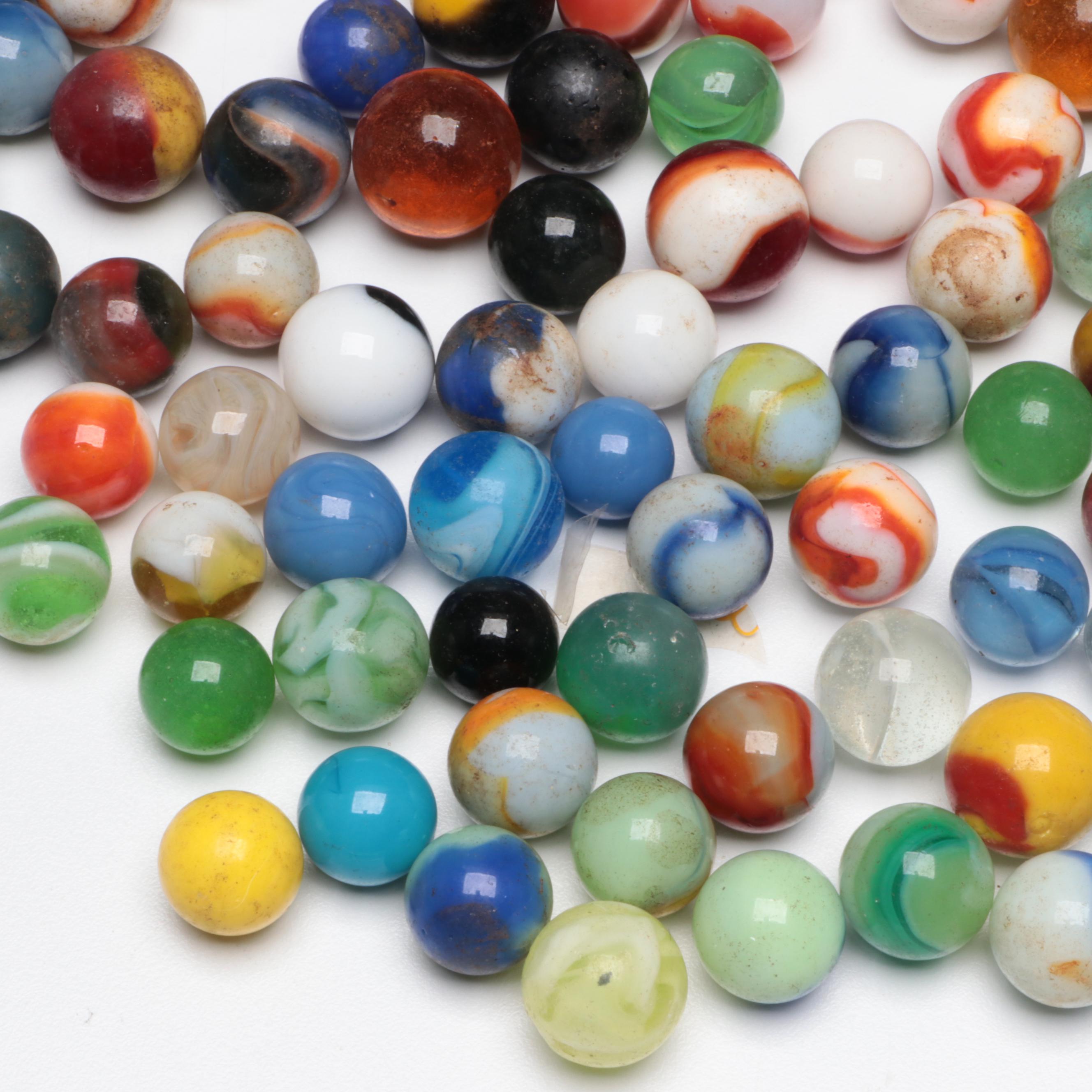 Uranium Glass with Other Marbles and Shooters