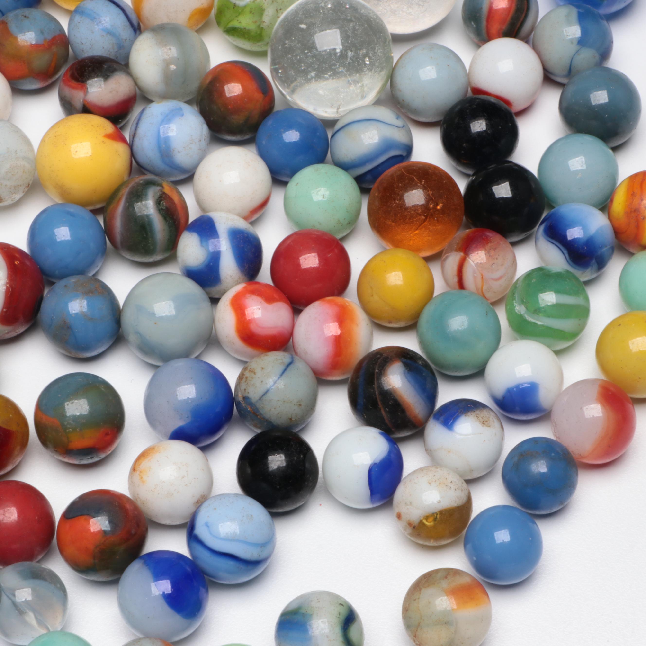 Uranium Glass with Other Marbles and Shooters