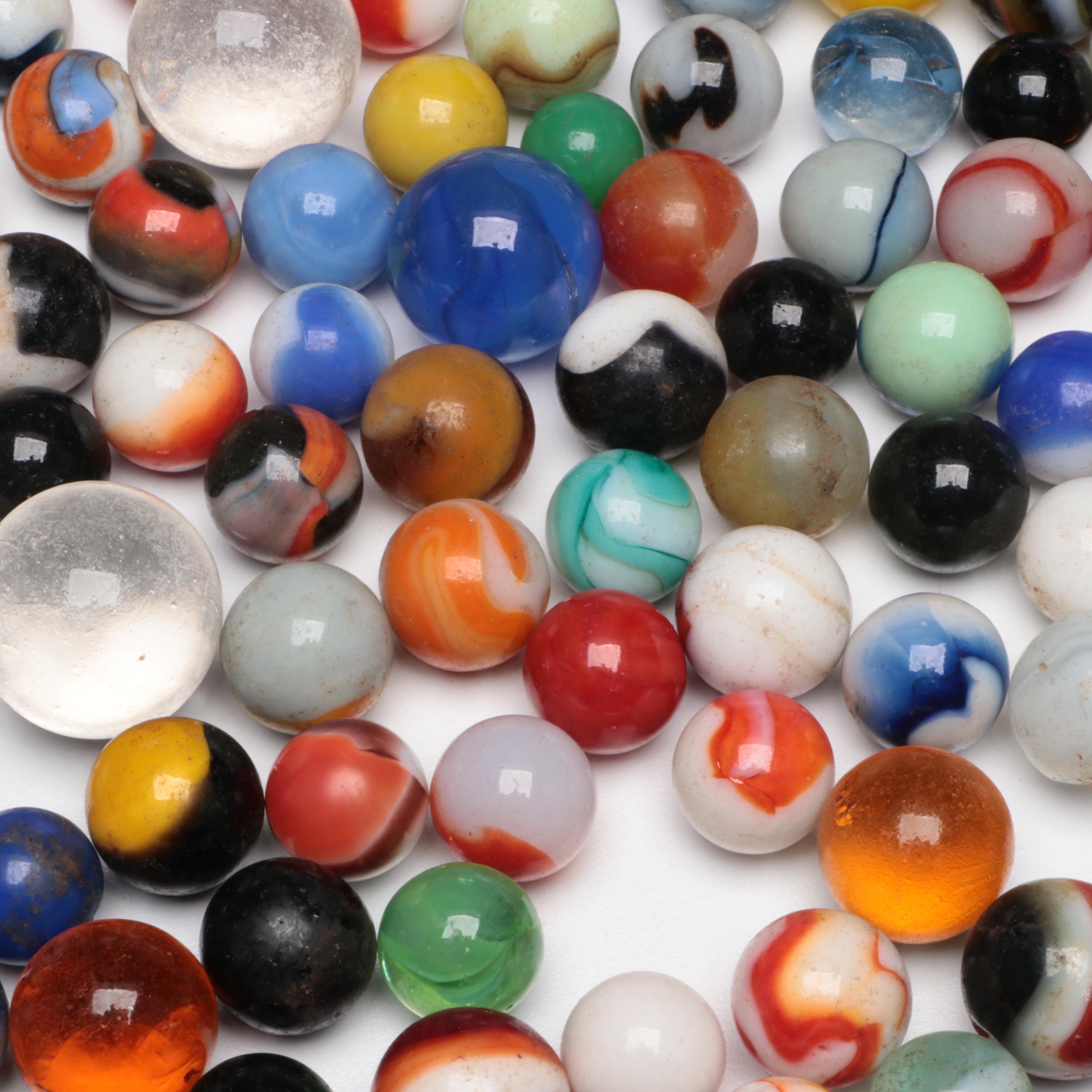 Uranium Glass with Other Marbles and Shooters