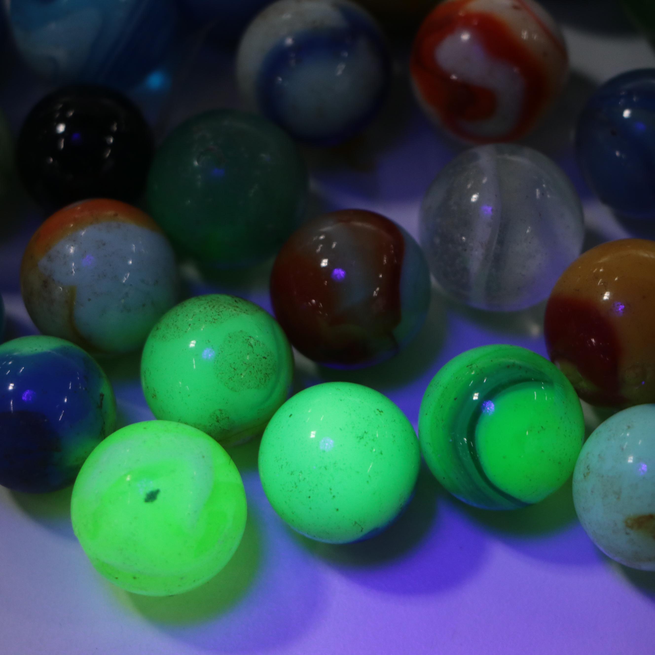 Uranium Glass with Other Marbles and Shooters