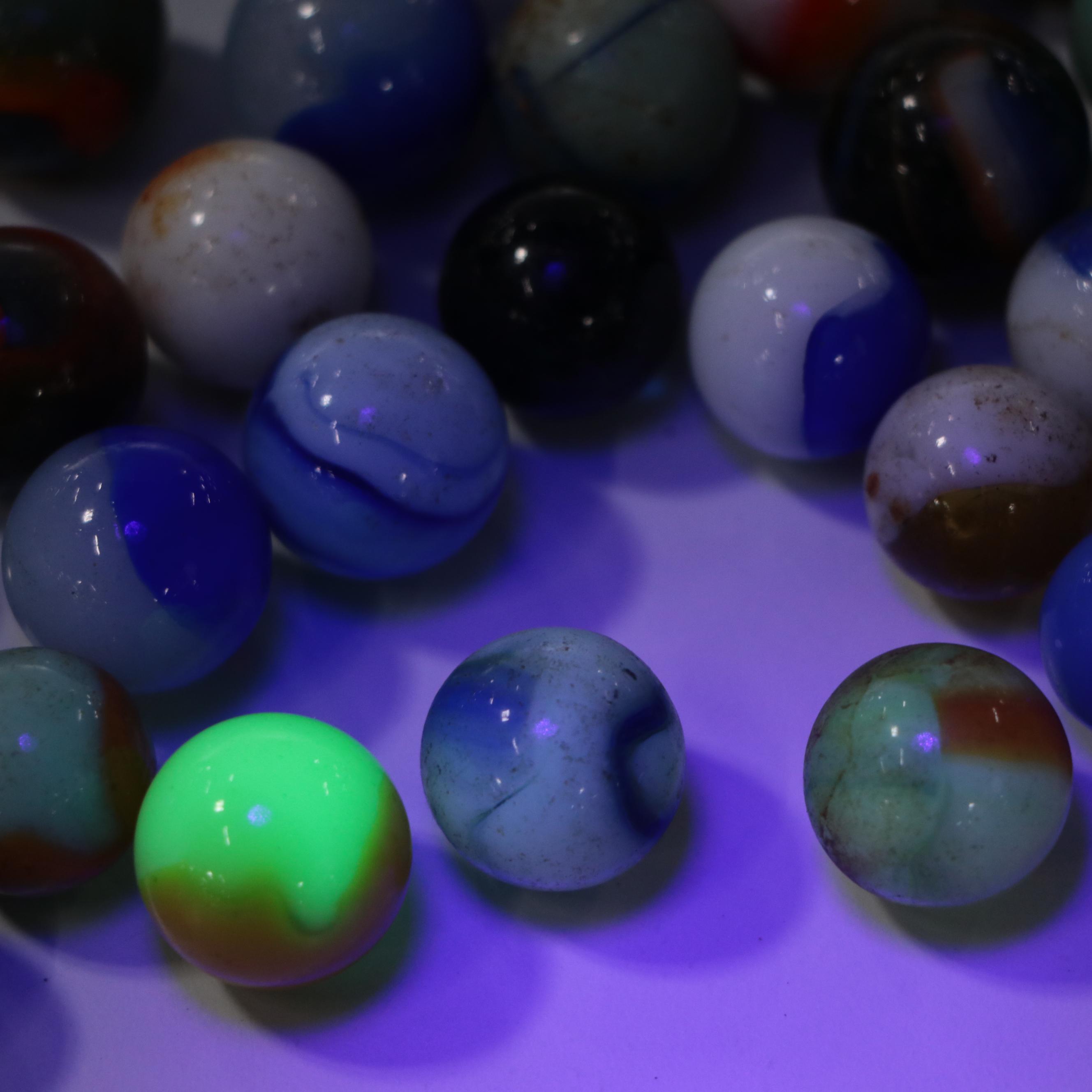 Uranium Glass with Other Marbles and Shooters