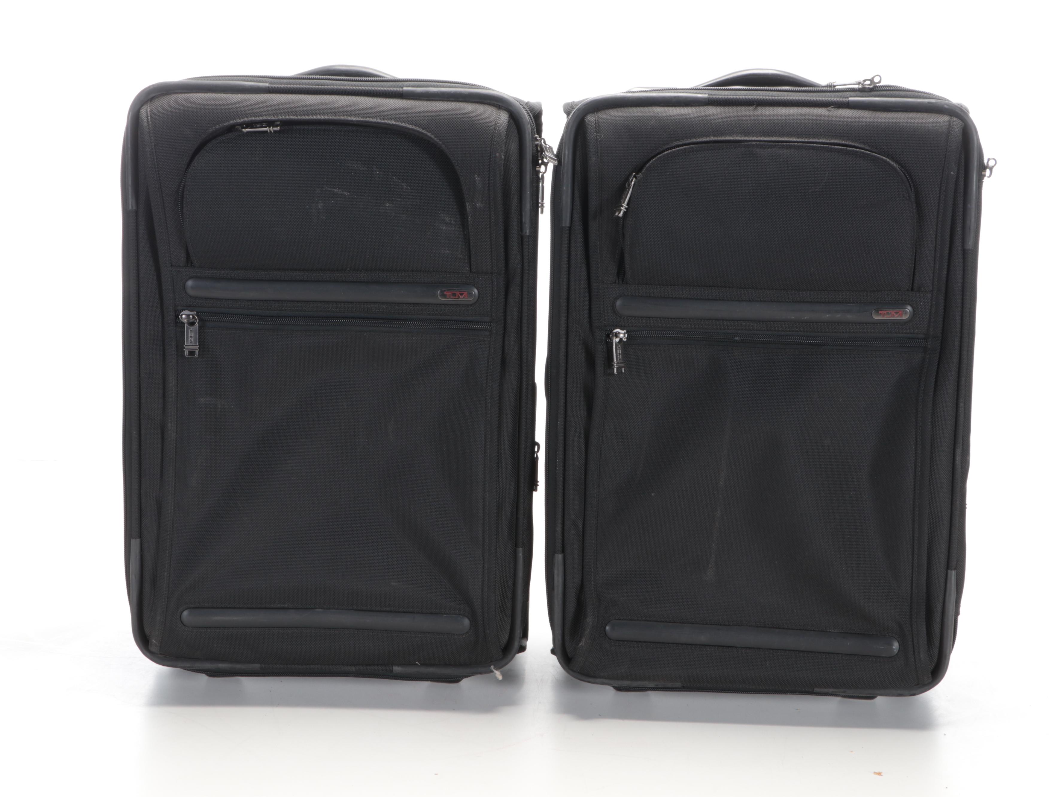Three Tumi Soft-Sided Rolling Suitcases