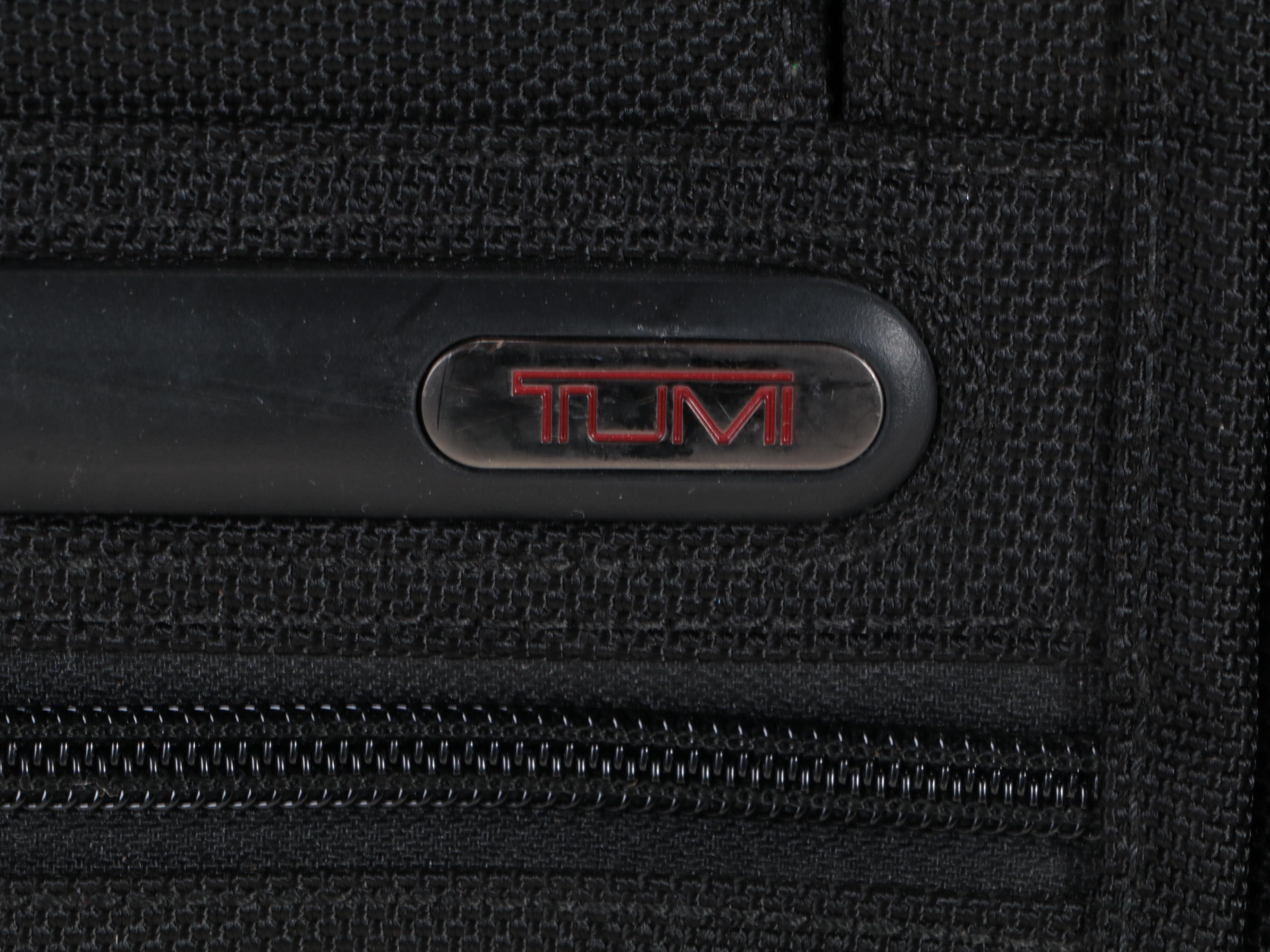 Three Tumi Soft-Sided Rolling Suitcases