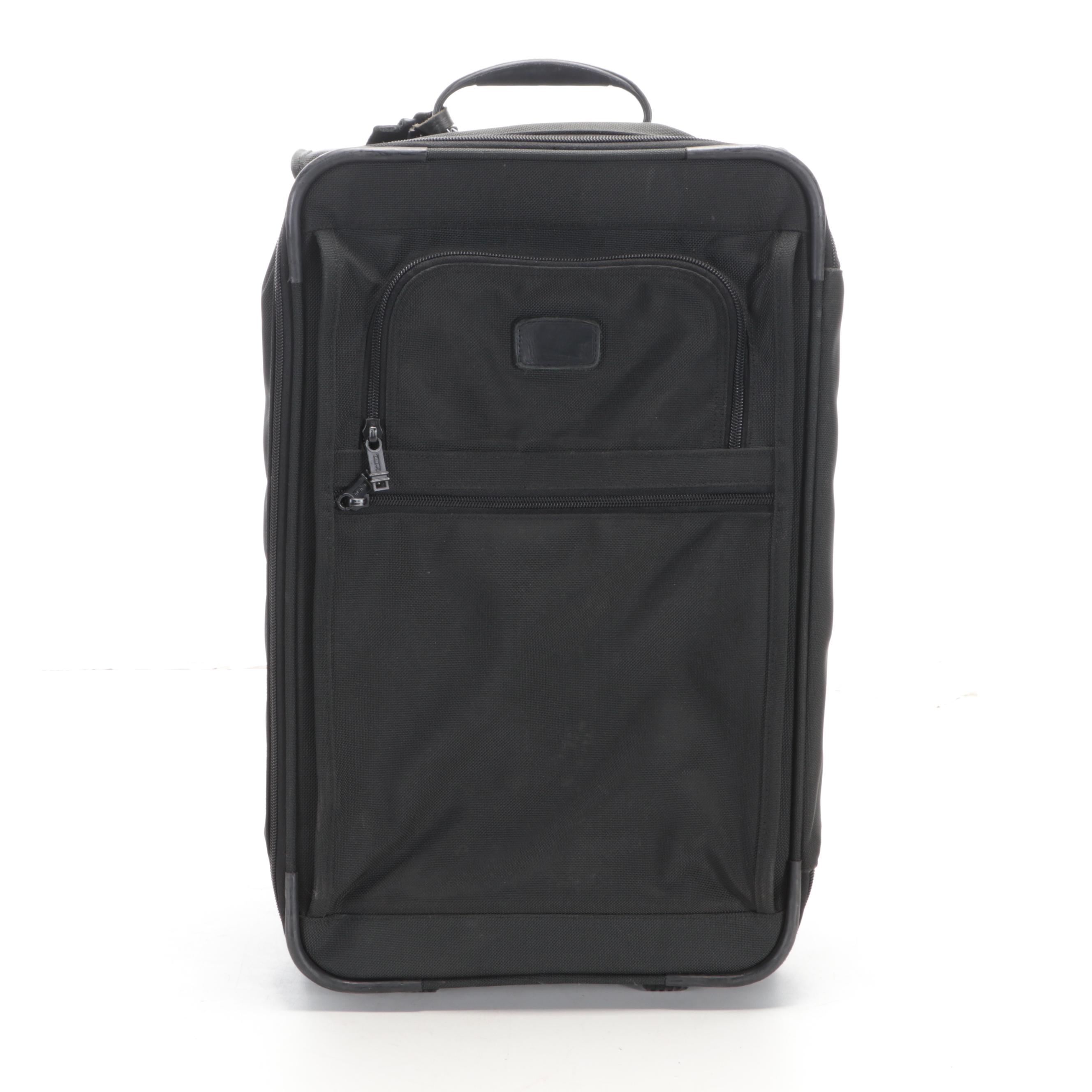 Three Tumi Soft-Sided Rolling Suitcases