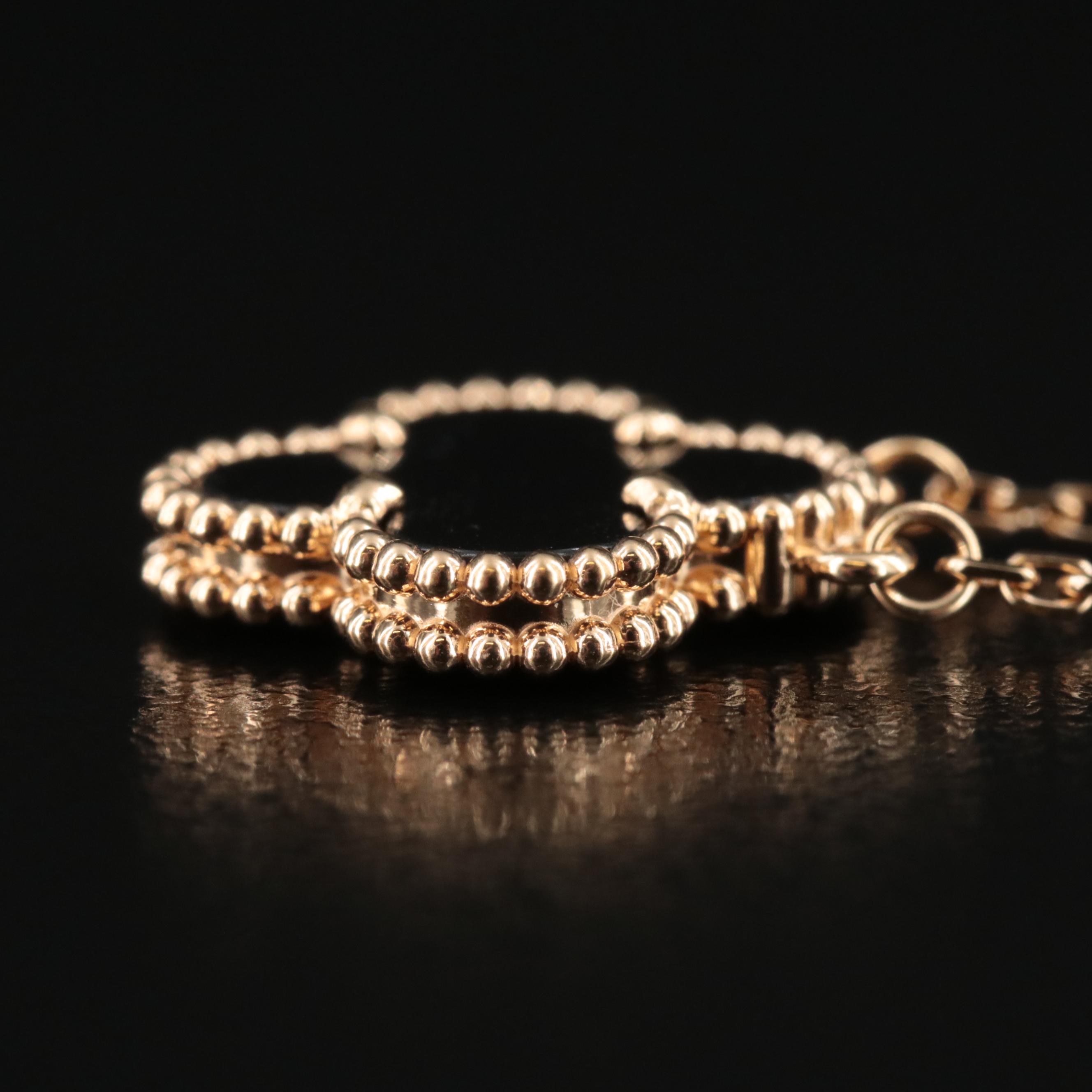 Van Cleef & Arpels "Alhambra" 18K Black Onyx Quatrefoil Necklace