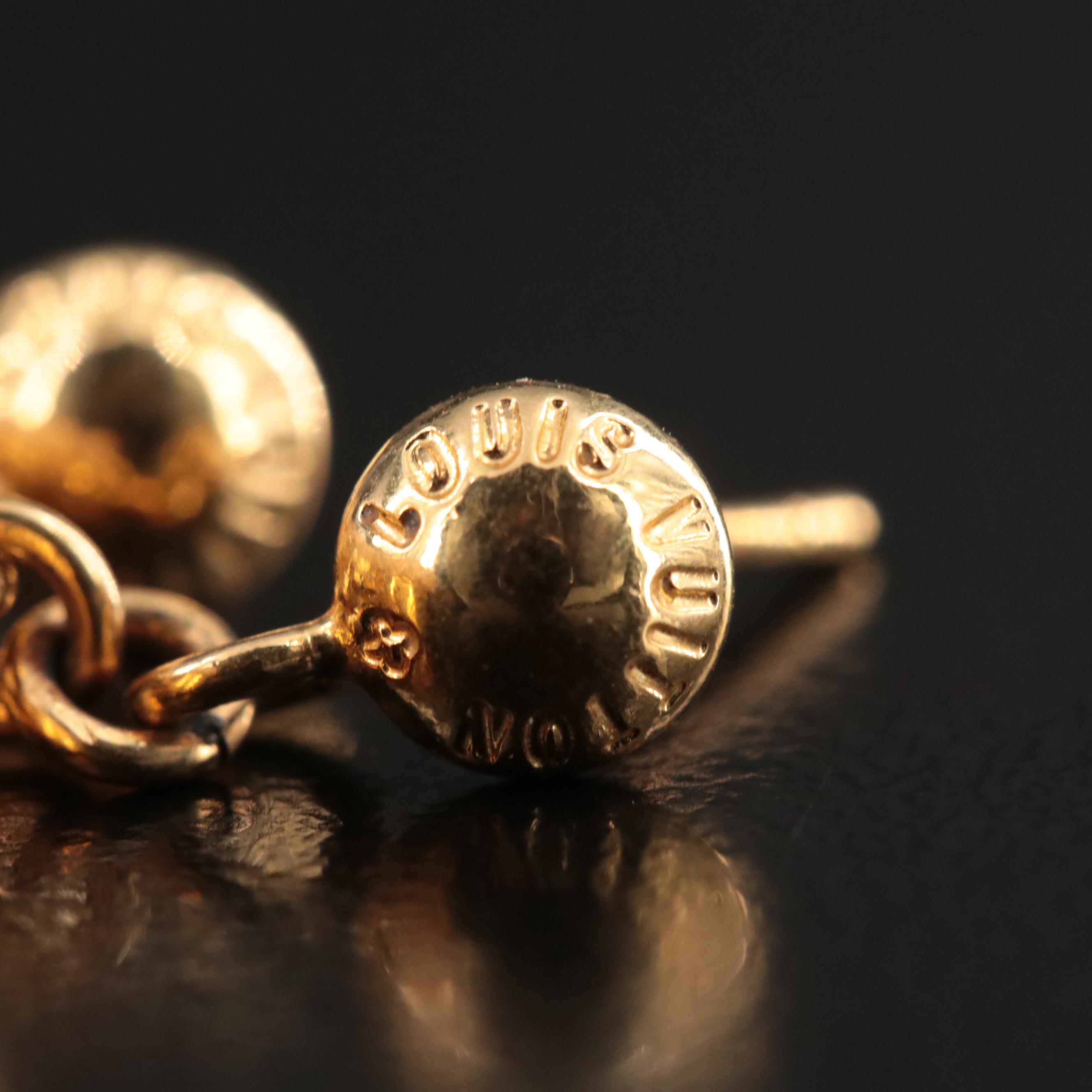 Louis Vuitton "Lock Me" Heart Earrings