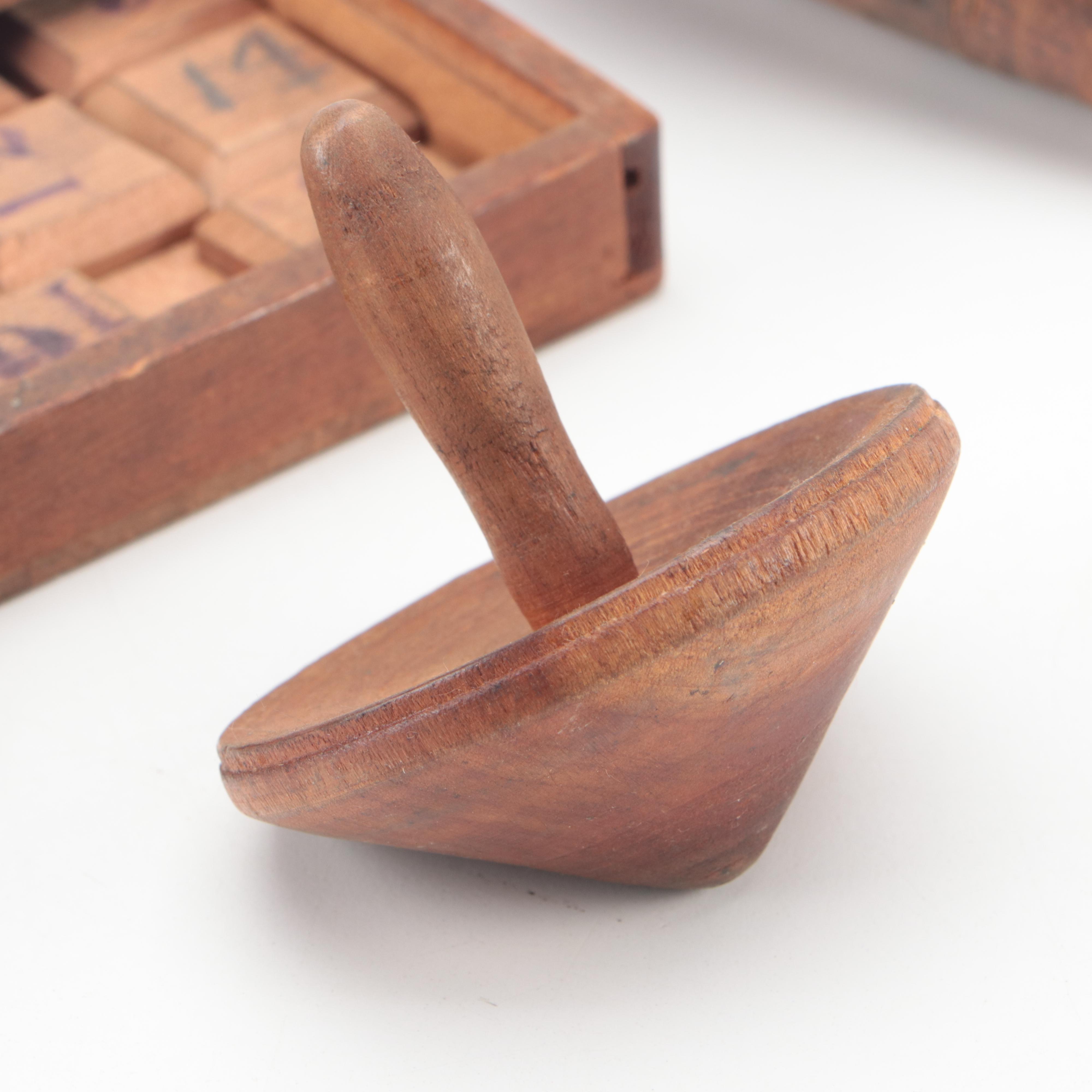 Trilobite Wooden Box with Number Tiles and Carved Wood Spinning Tops