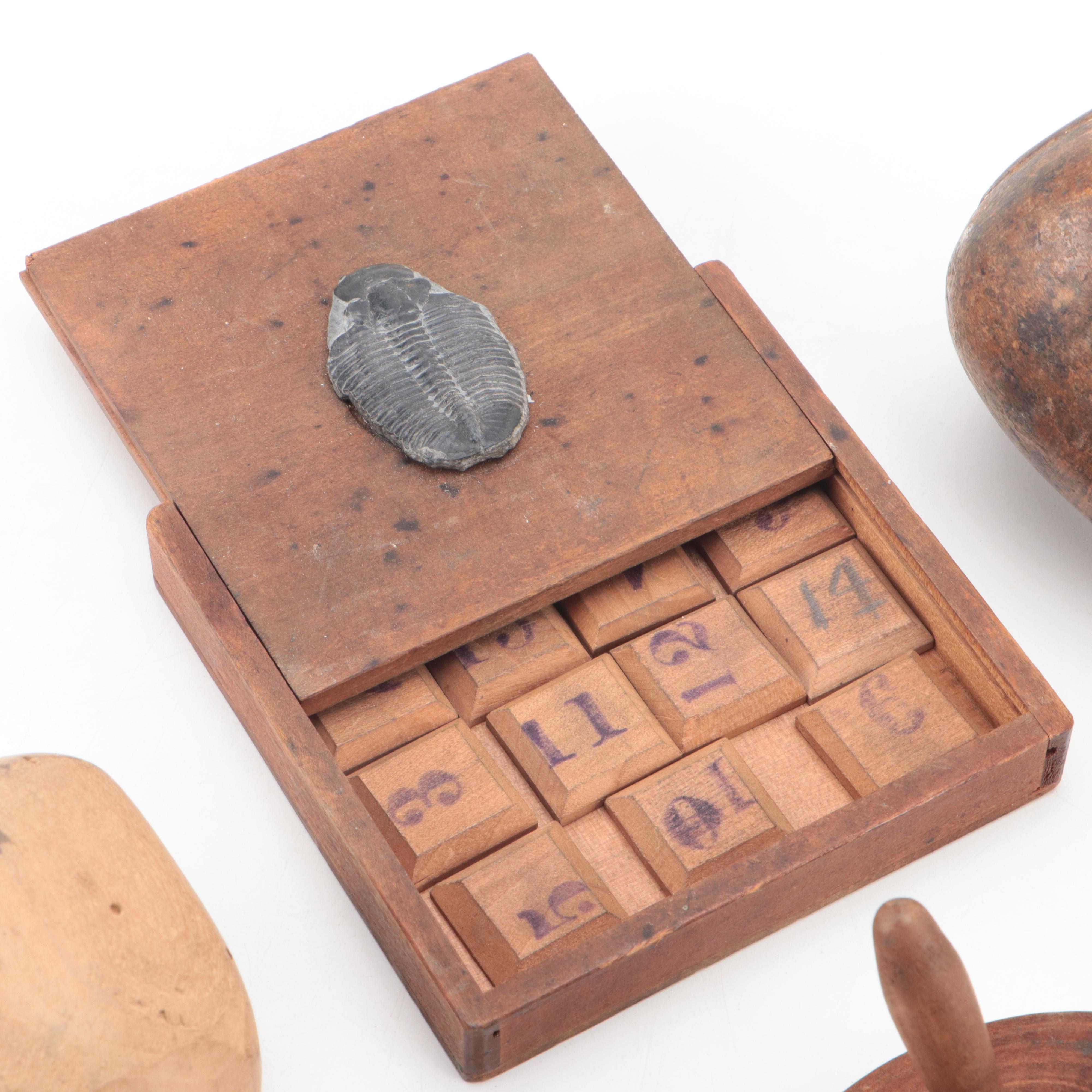 Trilobite Wooden Box with Number Tiles and Carved Wood Spinning Tops