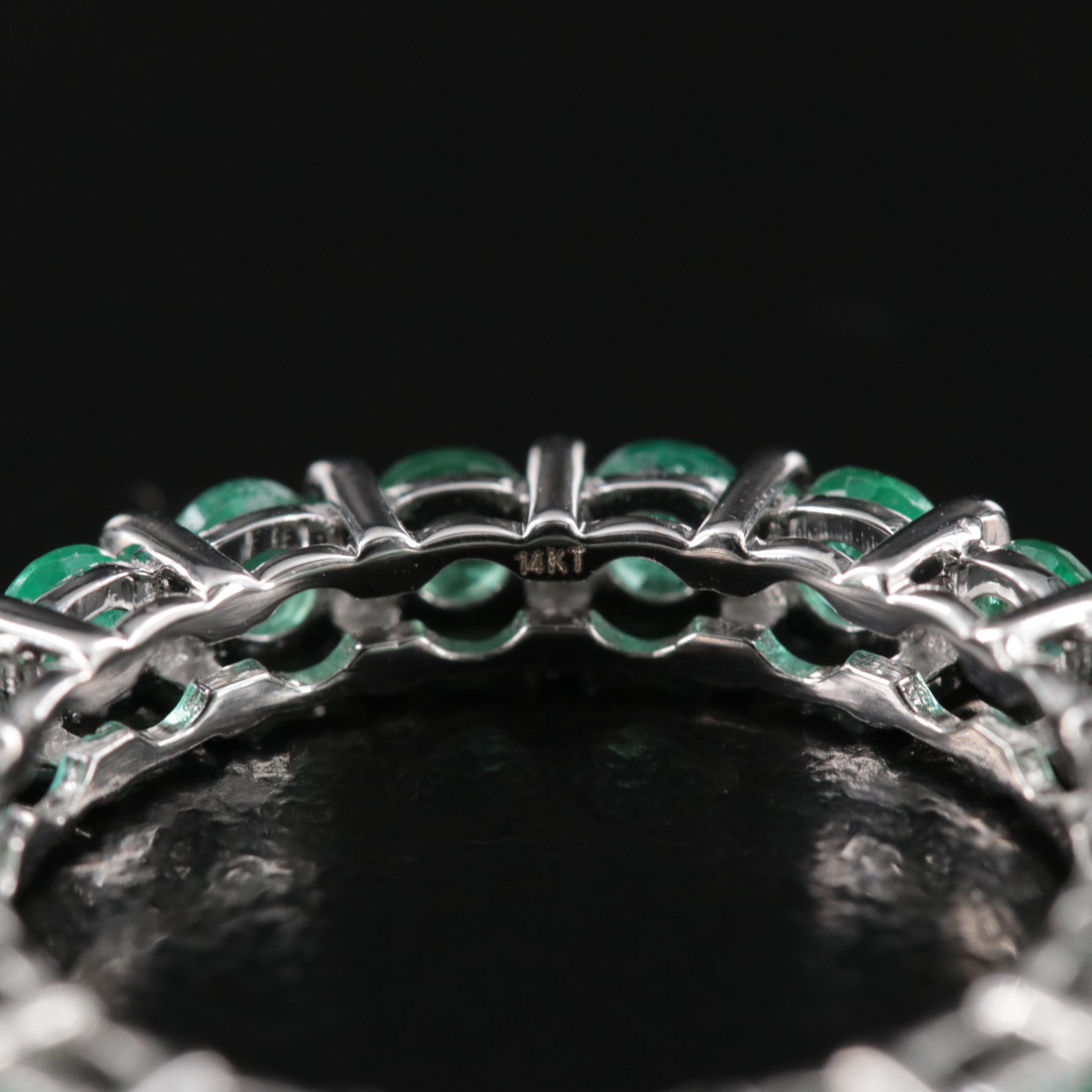 14K 2.72 CTW Emerald Eternity Band