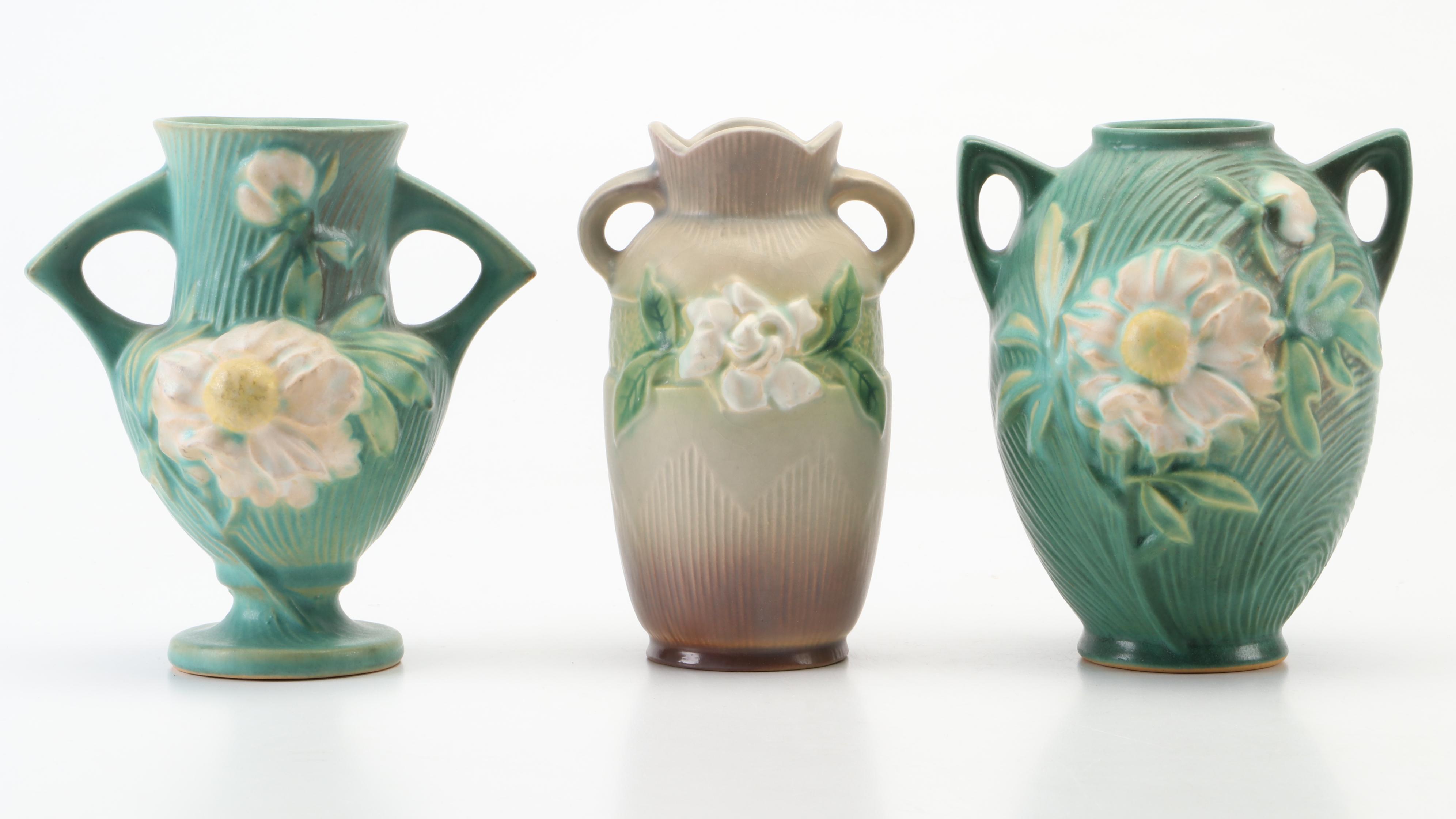 Roseville Pottery Gardenia and Peony Vases With Gardenia Candlesticks and Bowl