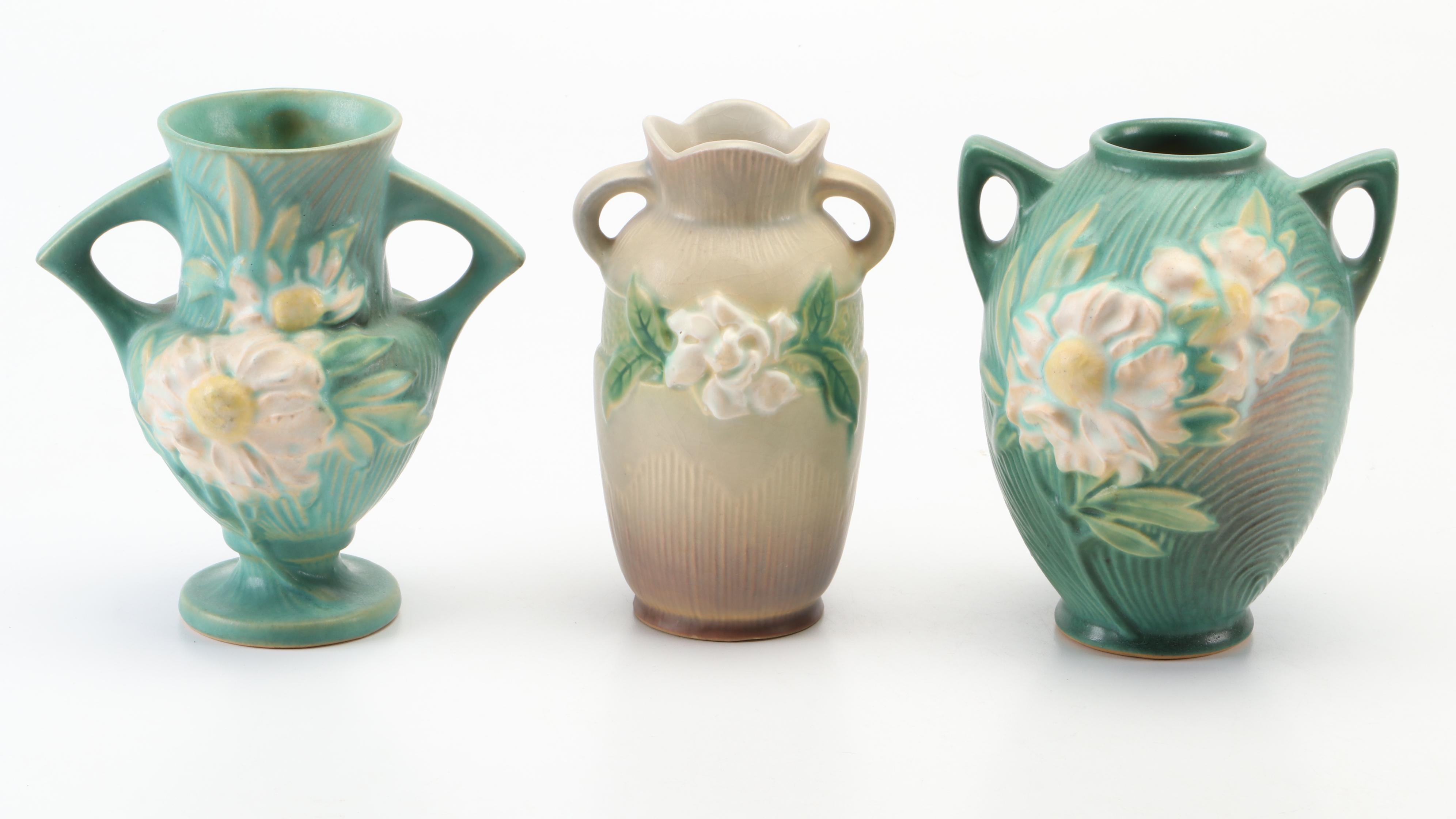 Roseville Pottery Gardenia and Peony Vases With Gardenia Candlesticks and Bowl