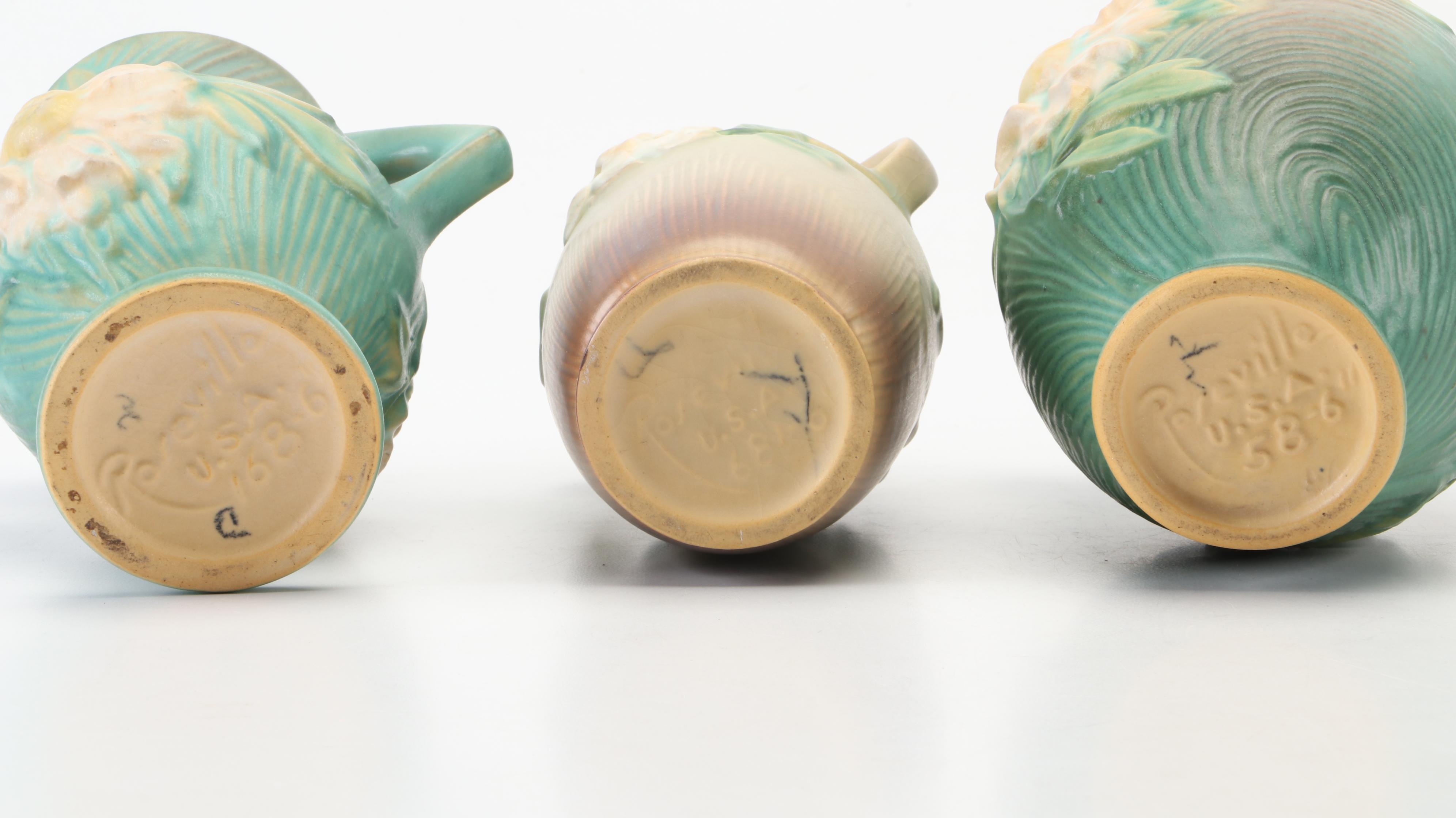 Roseville Pottery Gardenia and Peony Vases With Gardenia Candlesticks and Bowl