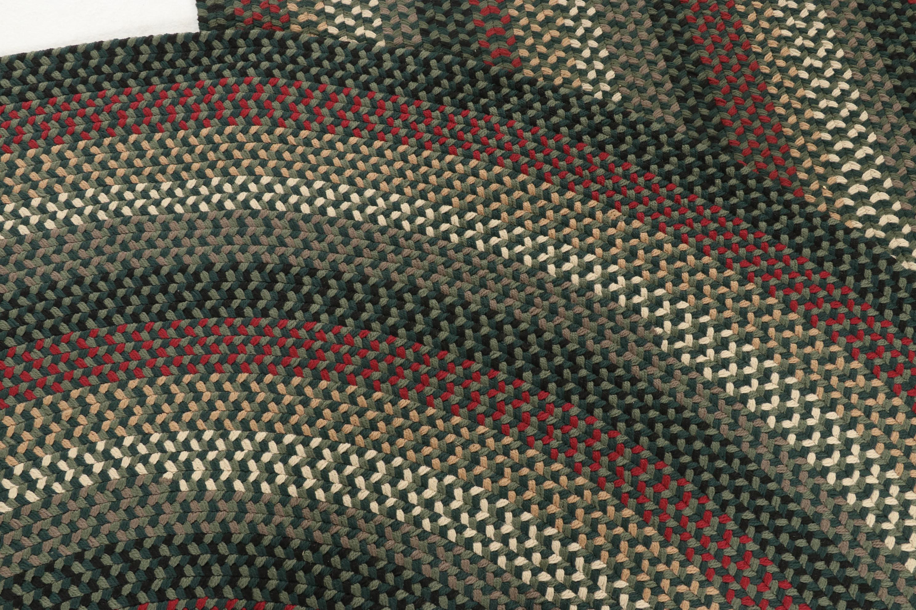 Two Oval Handmade Braided Area Rugs