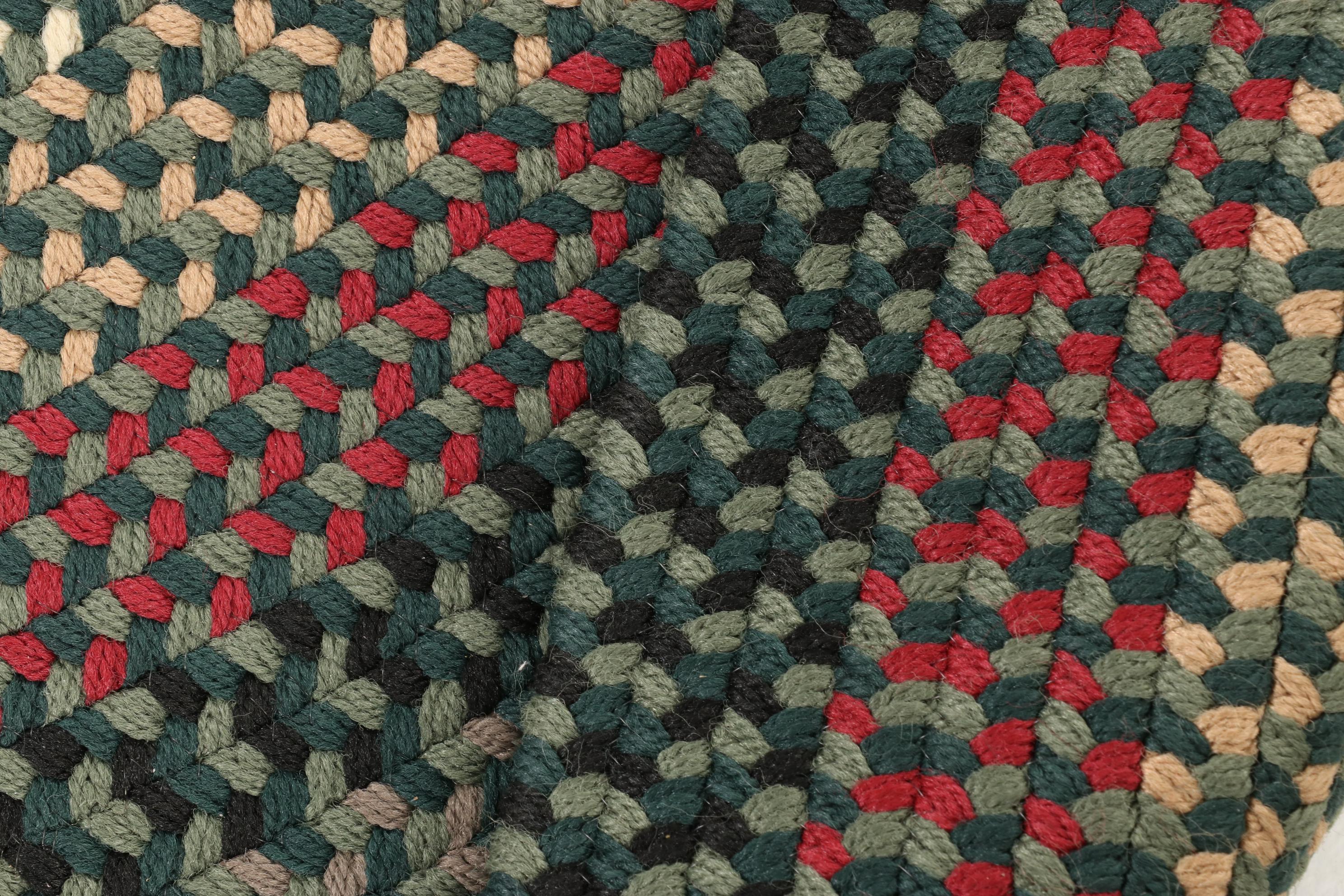 Two Oval Handmade Braided Area Rugs