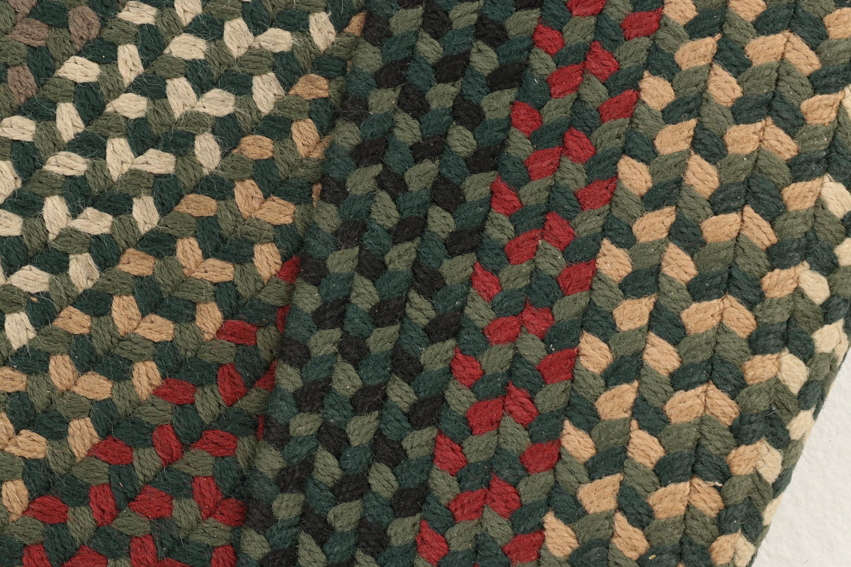 Two Oval Handmade Braided Area Rugs