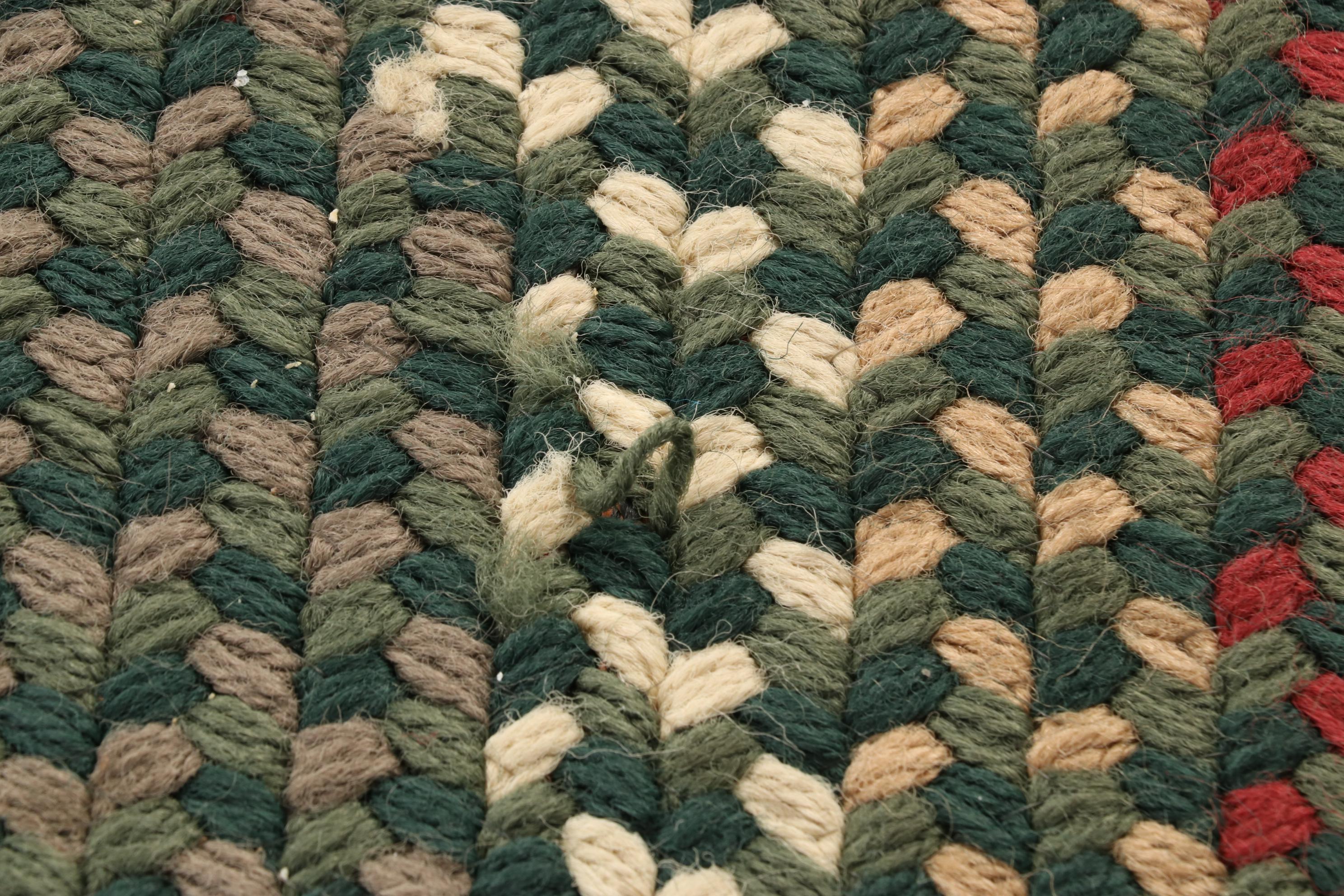 Two Oval Handmade Braided Area Rugs