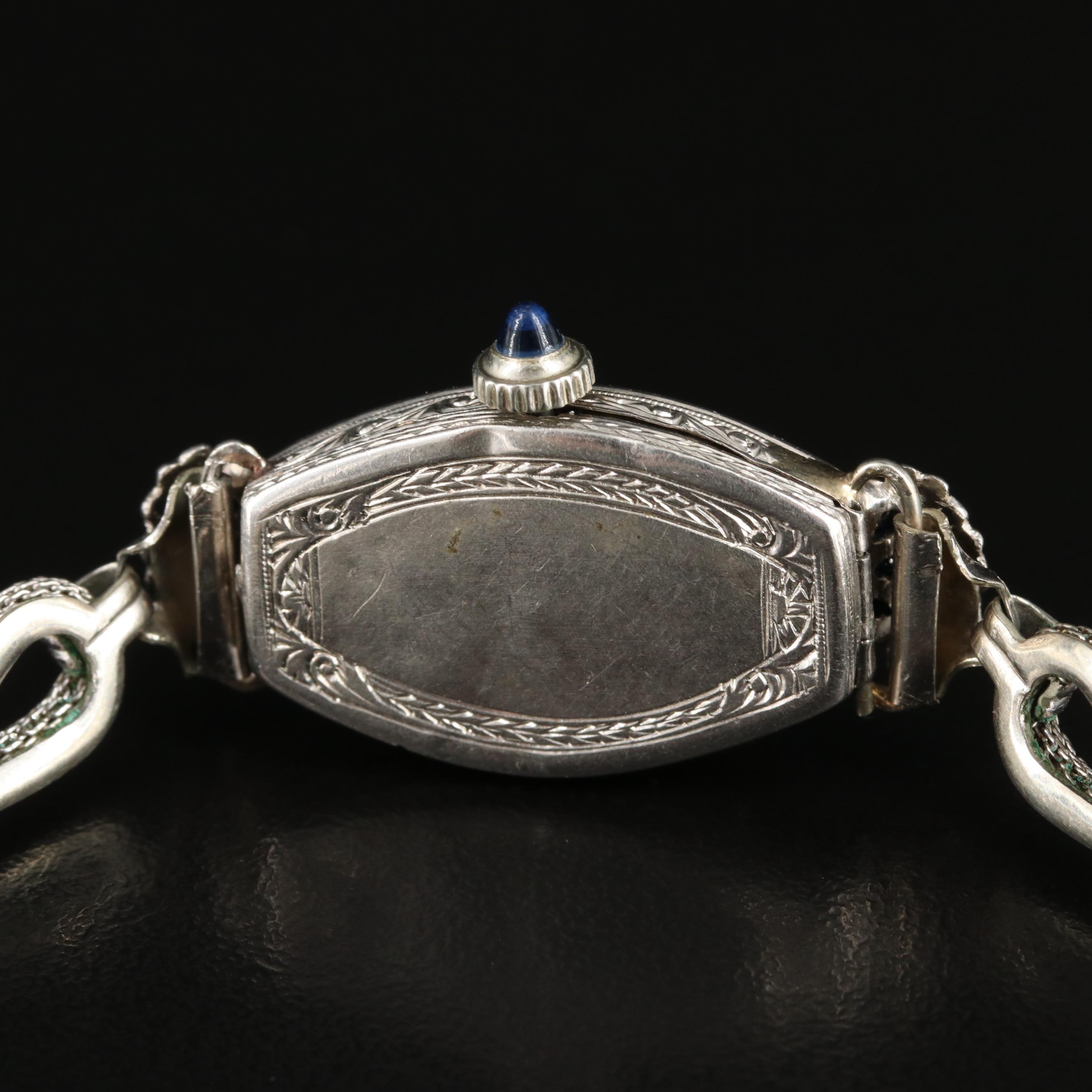 Platinum, Diamond and Sapphire Swiss Watch