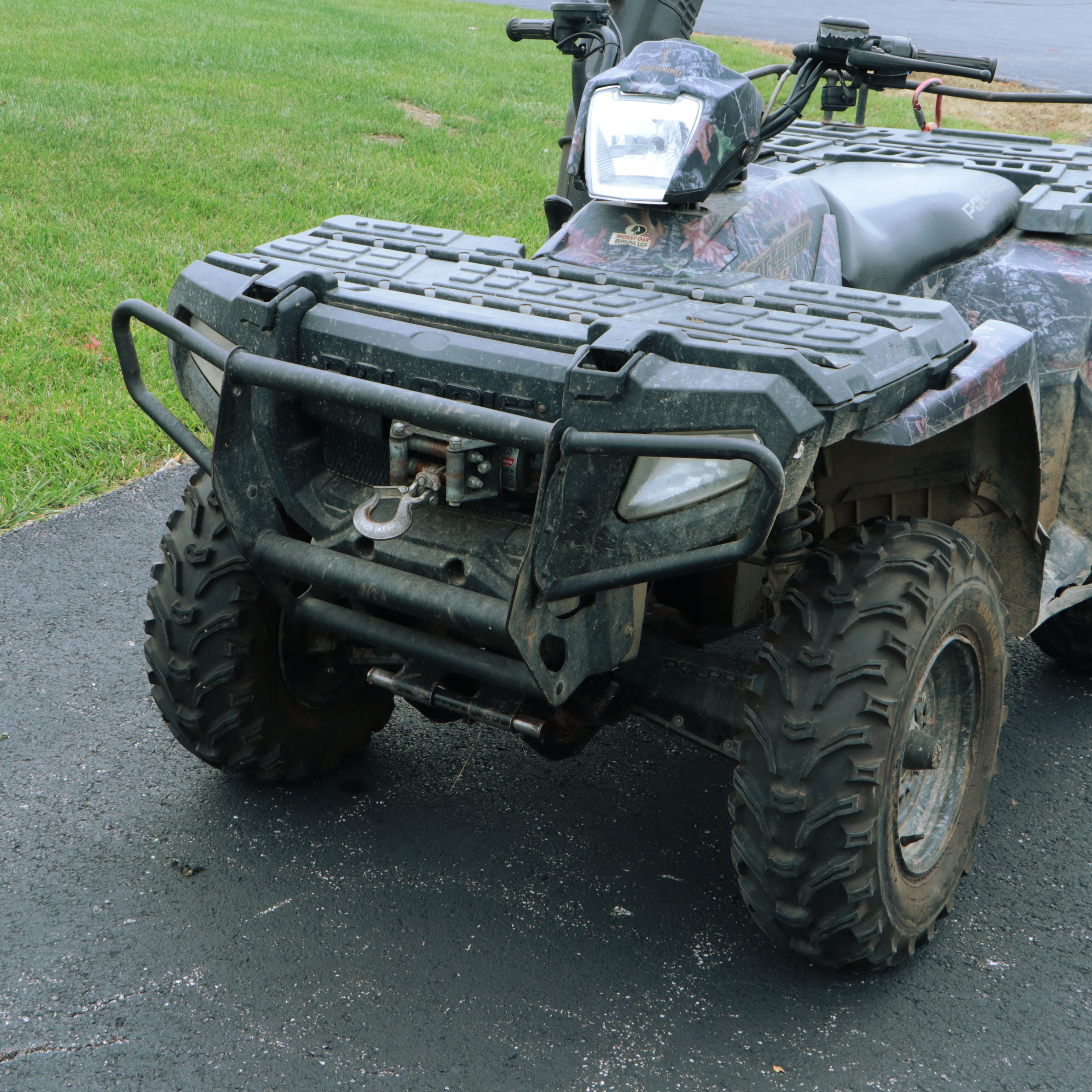 2006 Polaris Sportsman 450 ATV in Camo with Ramps, Snow Plow, and Accessories